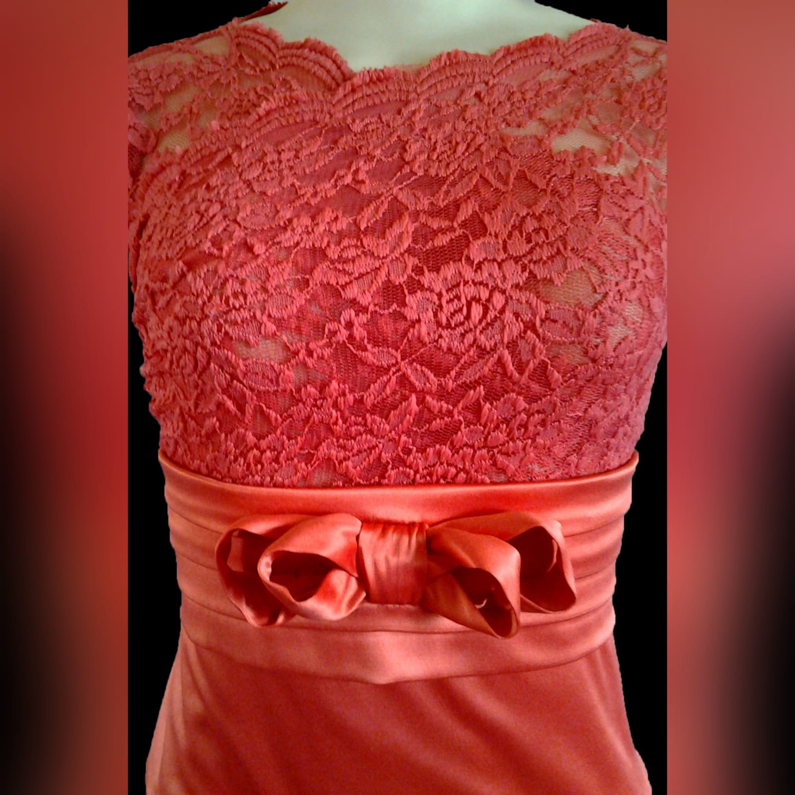 2 piece coral evening outfit 6 2 piece coral evening outfit for a stage performance. Lace top with short sleeves, with a high waisted pencil skirt with a pleated waistband with a bow detail.
