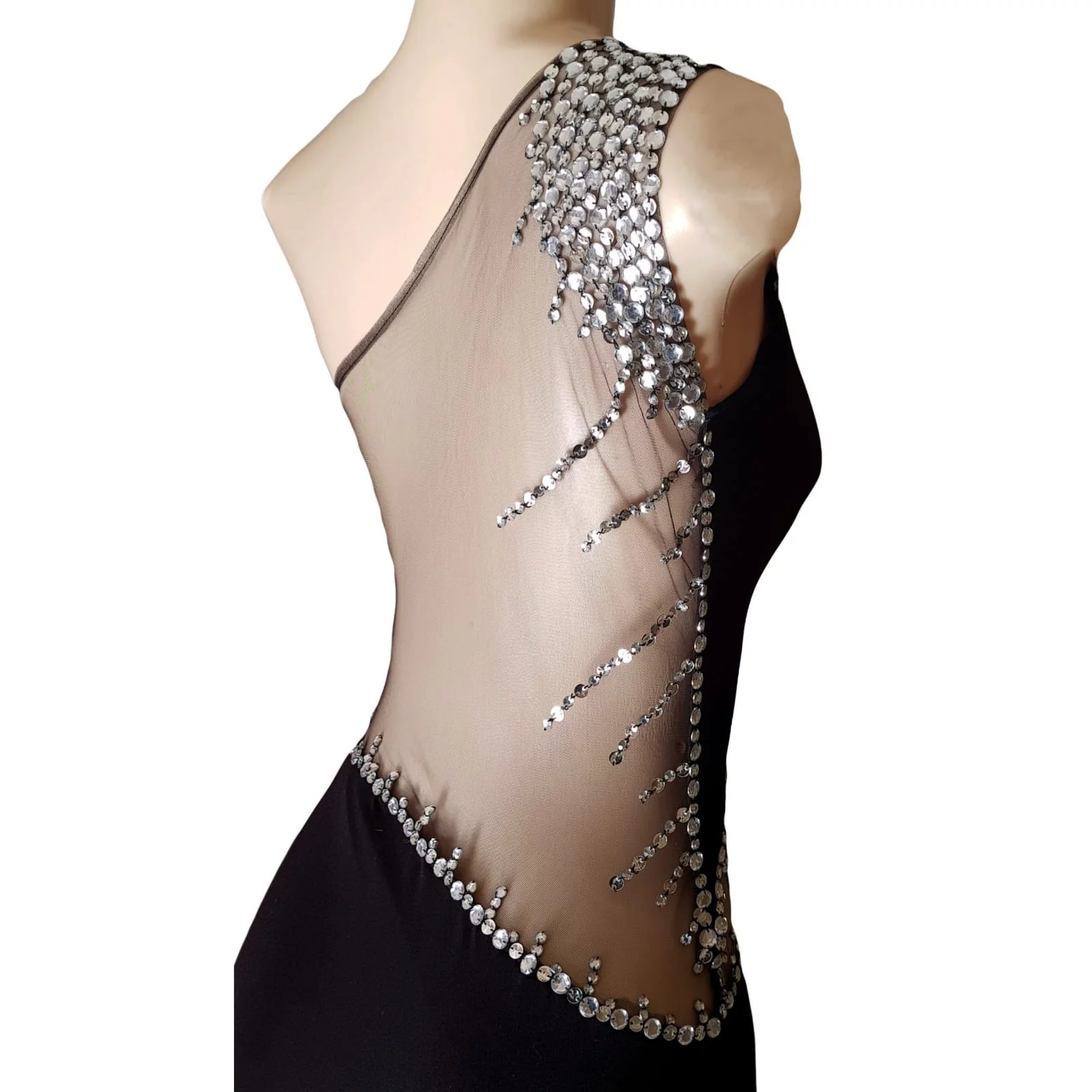 Black and silver long matric dance dress 4 black and silver long matric dance dress with single shoulder design, illusion angled tummy and back detailed with silver beads. With a slit and a train.