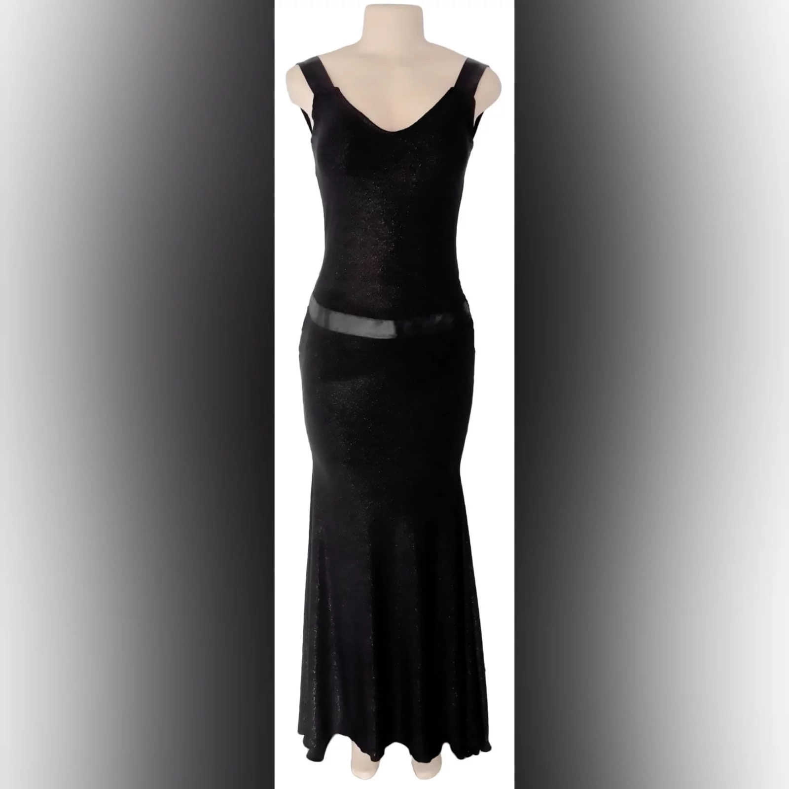 Black shimmer long gala evening dress 3 black shimmer long gala evening dress, with a low v open back. With ribbon creating a belt and a cross at the back