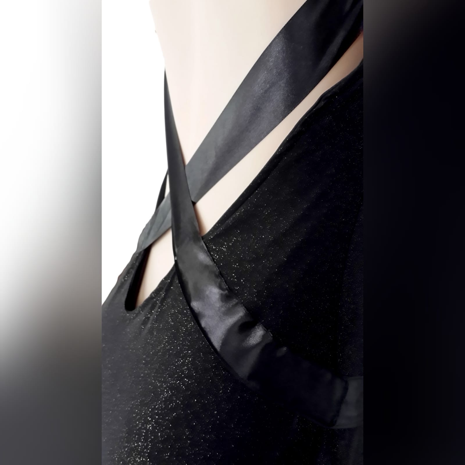 Black shimmer long gala evening dress 4 black shimmer long gala evening dress, with a low v open back. With ribbon creating a belt and a cross at the back