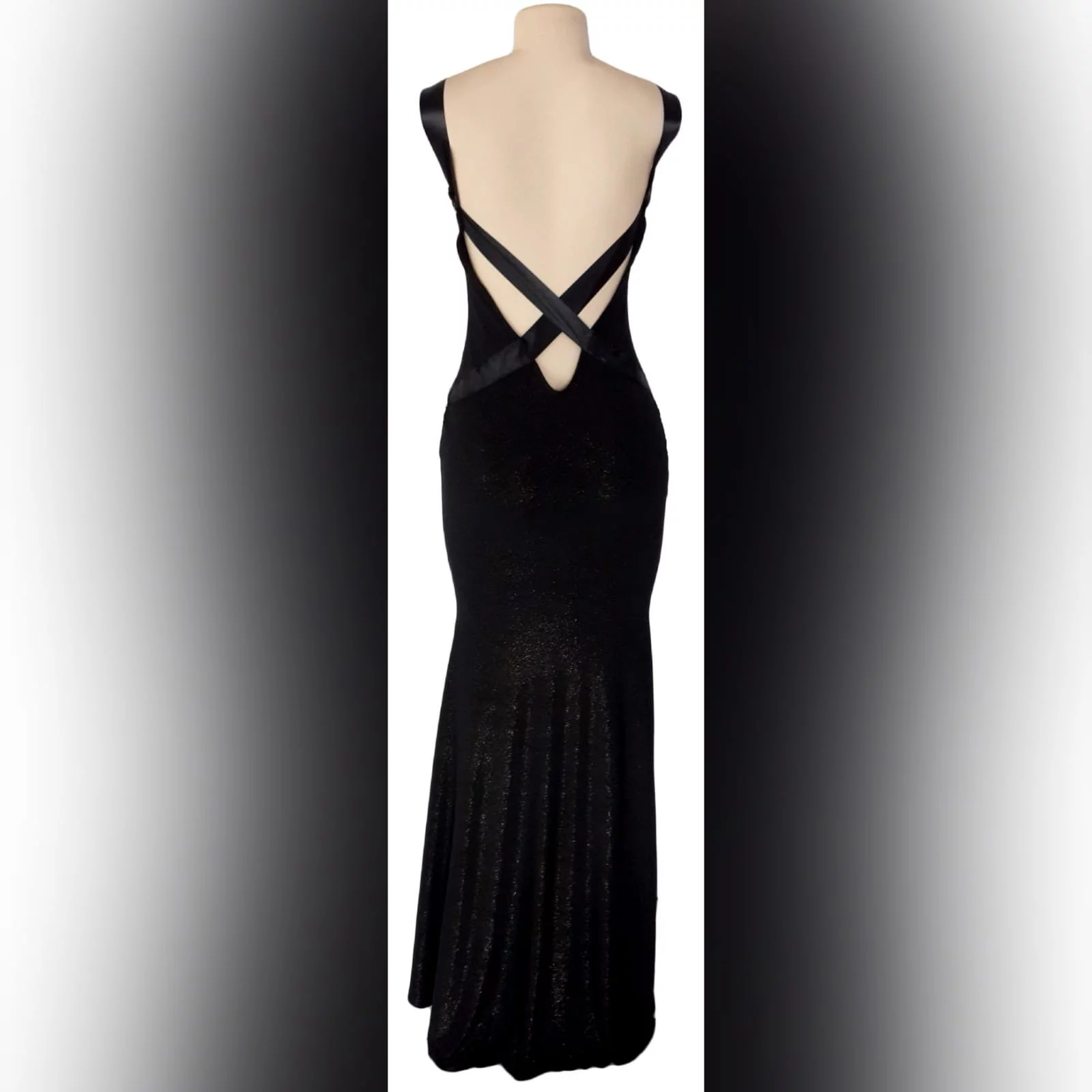 Black shimmer long gala evening dress 1 black shimmer long gala evening dress, with a low v open back. With ribbon creating a belt and a cross at the back