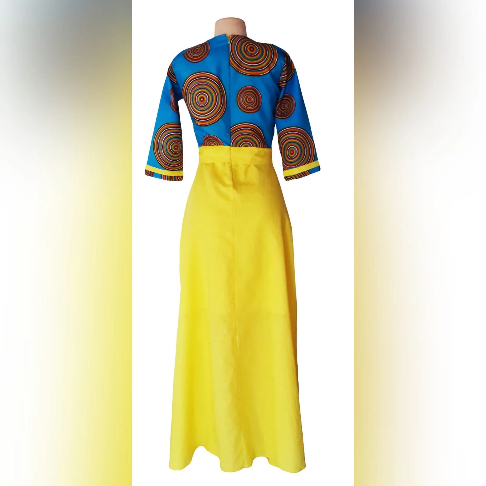 Blue & yellow modern traditional dress 7 modern traditional blue and yellow empire fit dress. Flowy bottom, neckline with a slit.