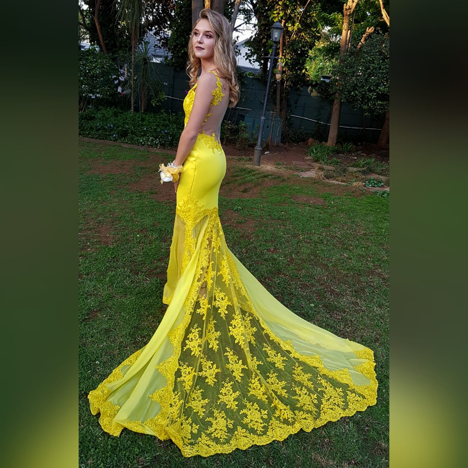 Canary yellow lace soft mermaid prom dress 1 canary yellow, lace, soft mermaid prom dance dress with sheer legs, detailed with lace. With an illusion open back.