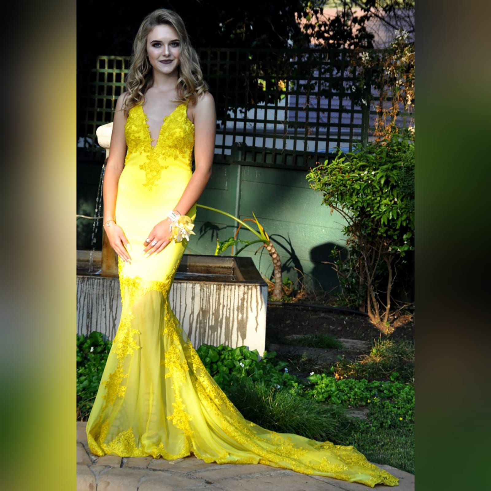 Canary yellow lace soft mermaid prom dress 8 canary yellow, lace, soft mermaid prom dance dress with sheer legs, detailed with lace. With an illusion open back.