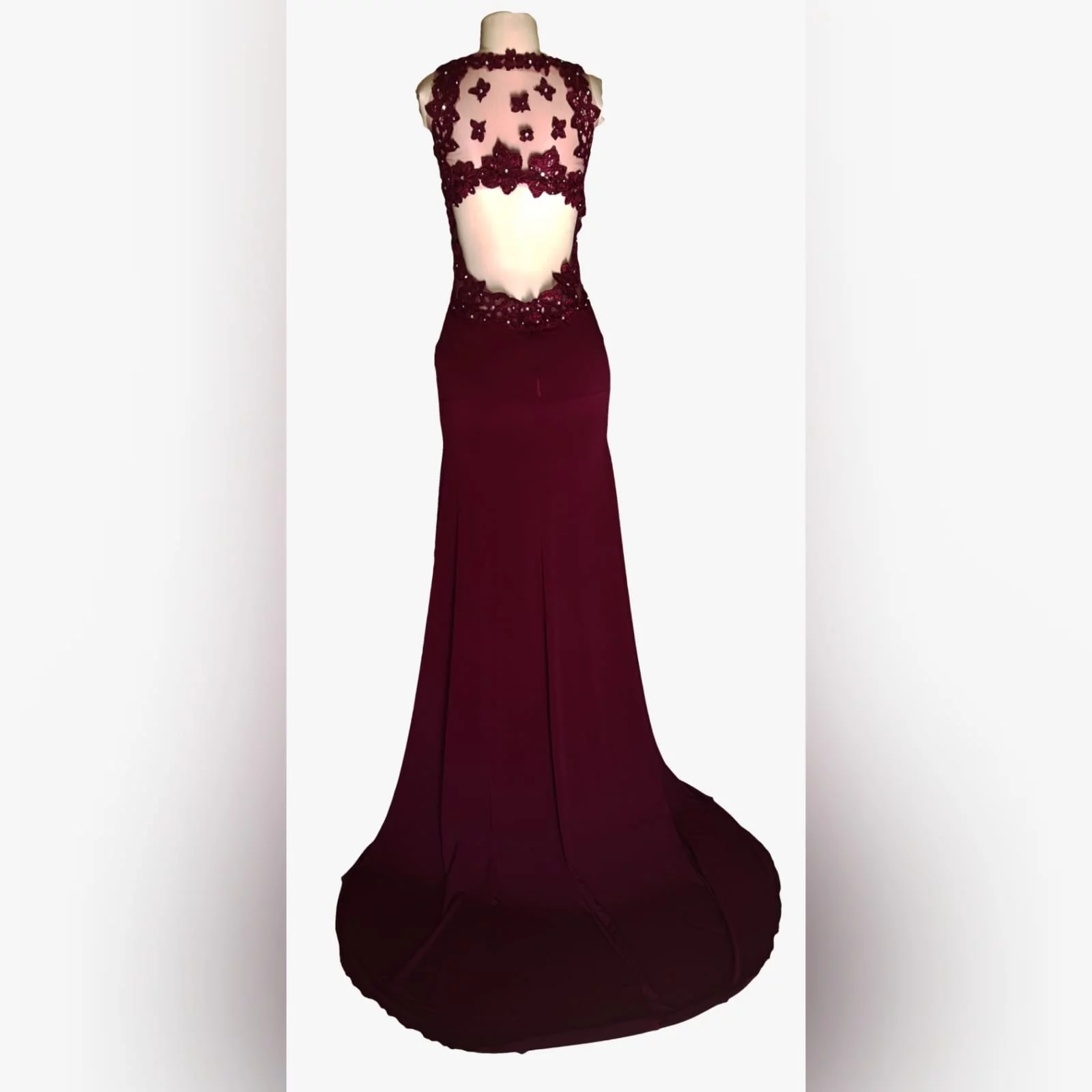 Burgundy long sexy prom dress 6 burgundy long sexy prom dress with an illusion lace low back and side tummy. Sweetheart neckline detailed with lace. With a slit and a train.