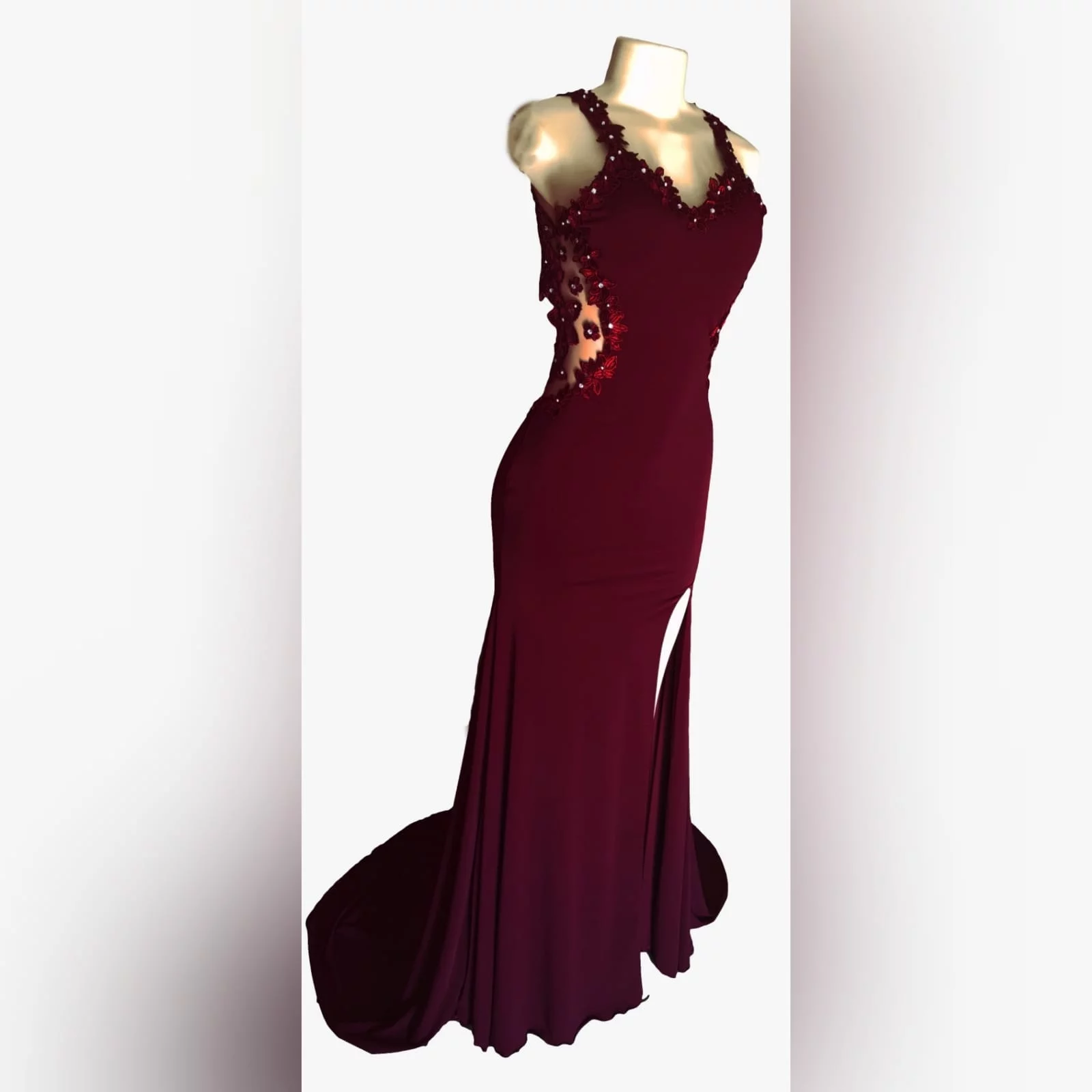 Burgundy long sexy prom dress 9 burgundy long sexy prom dress with an illusion lace low back and side tummy. Sweetheart neckline detailed with lace. With a slit and a train.