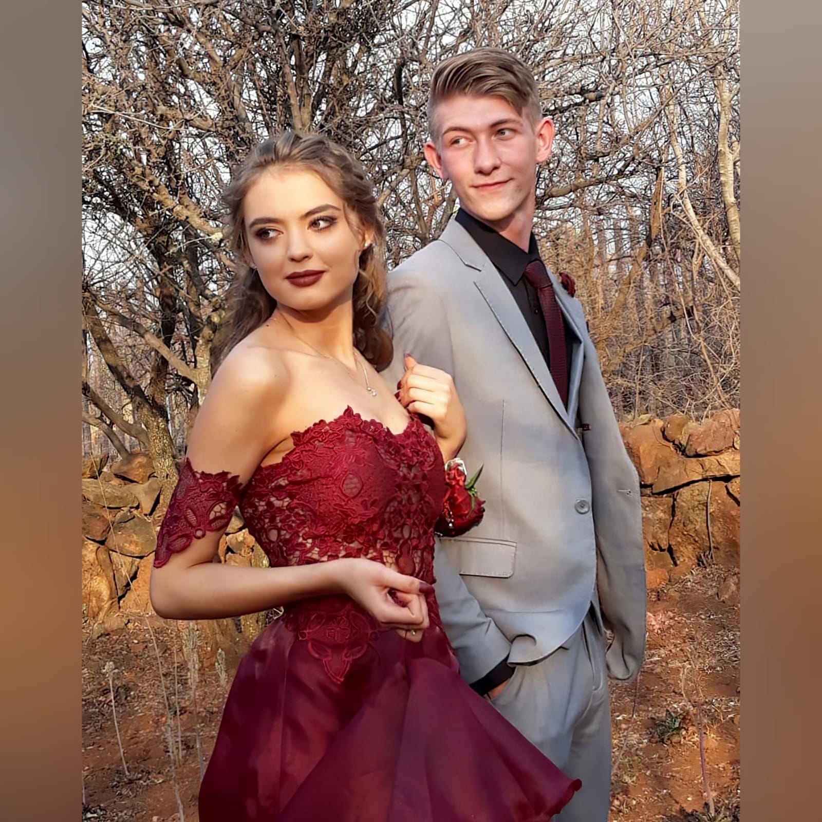 Dark red high low evening dress 3 the perfect dark red evening dress for your prom night if you want to look elegant yet adorable. With a lace bodice and a double layer hi - lo flowy bottom for a slight dramatic effect.