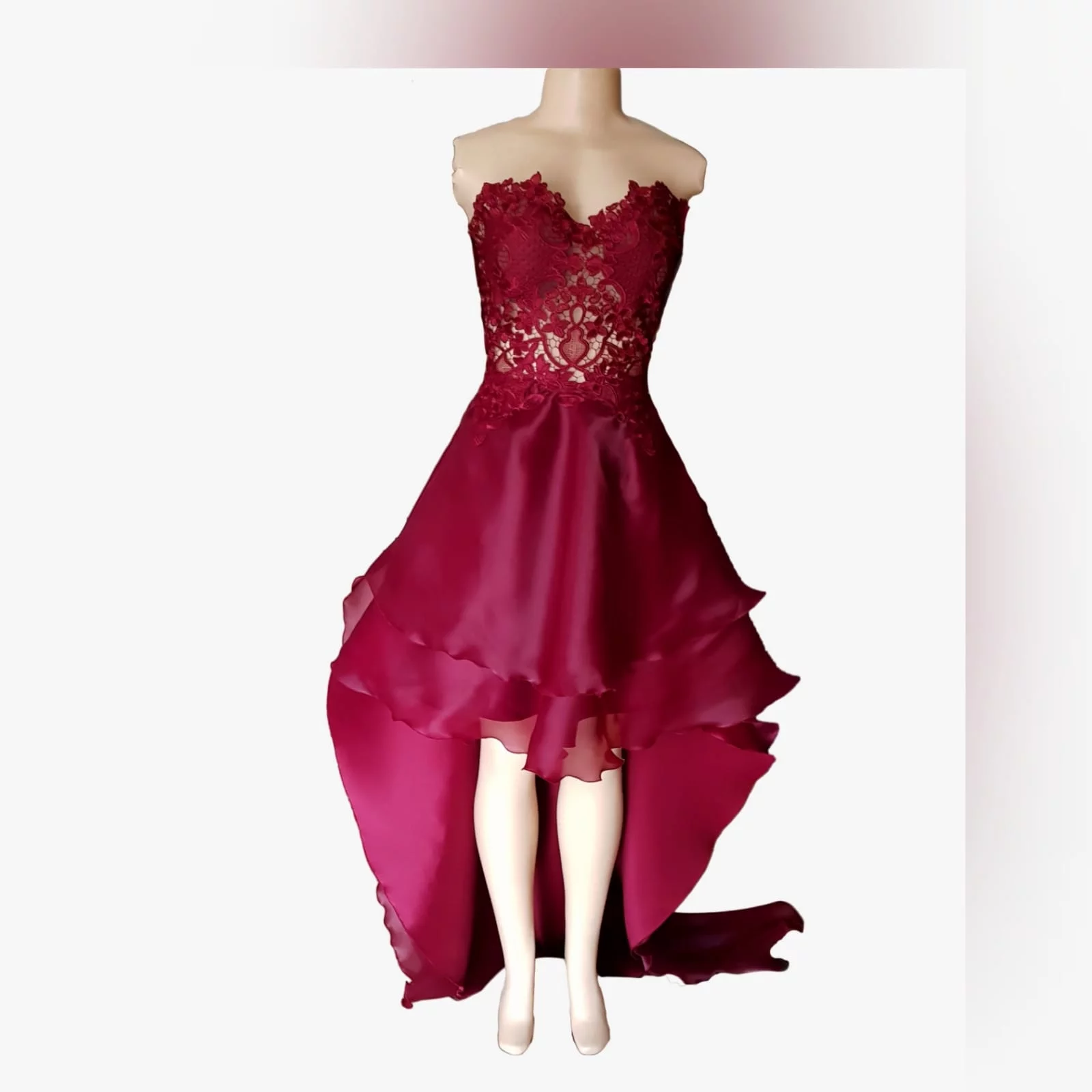 Dark red high low evening dress 7 the perfect dark red evening dress for your prom night if you want to look elegant yet adorable. With a lace bodice and a double layer hi - lo flowy bottom for a slight dramatic effect.