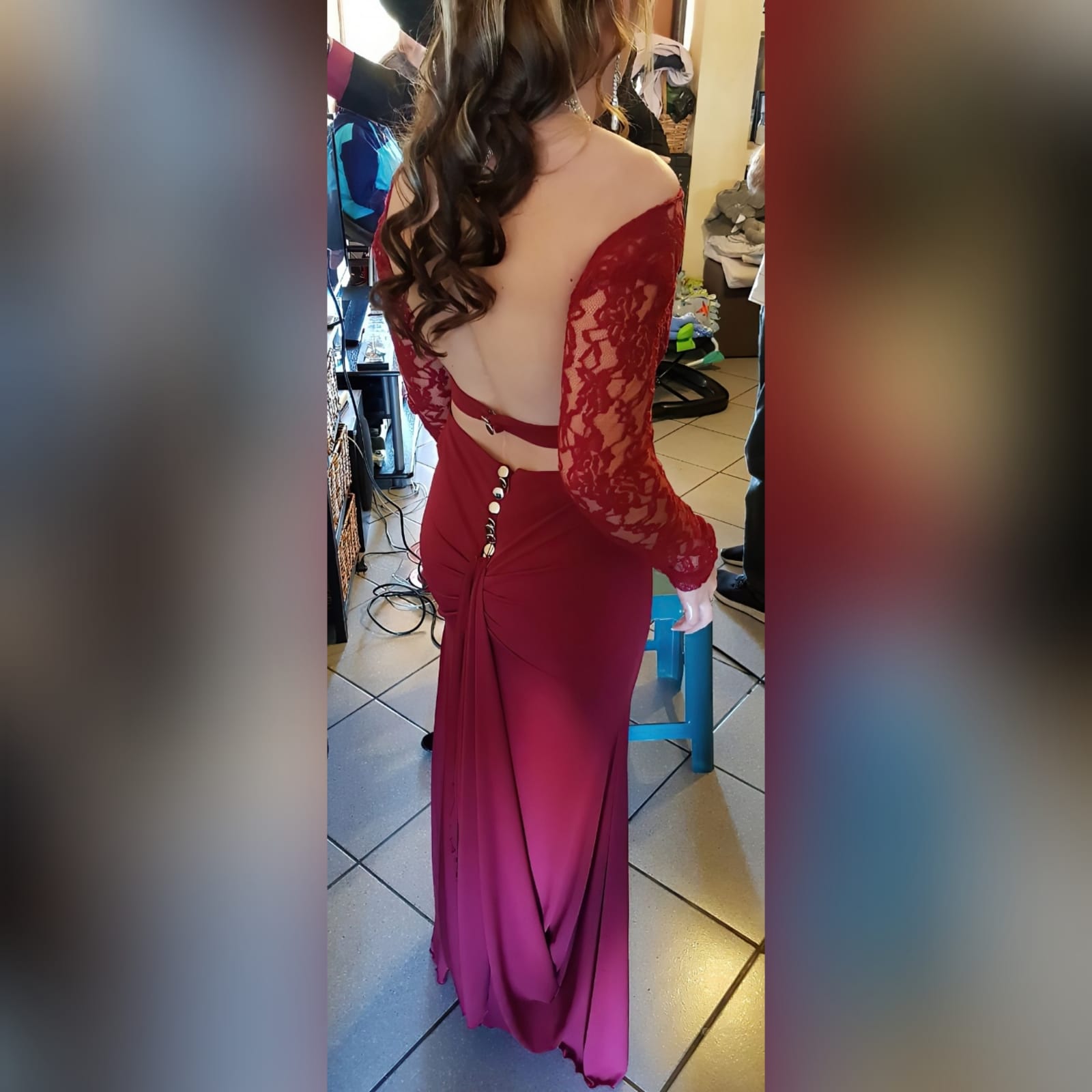 Deep red long sheer lace bodice prom dress 1 deep red long sheer lace bodice prom dress. Long off the shoulder lace sleeves with a rounded open back, slit and train.