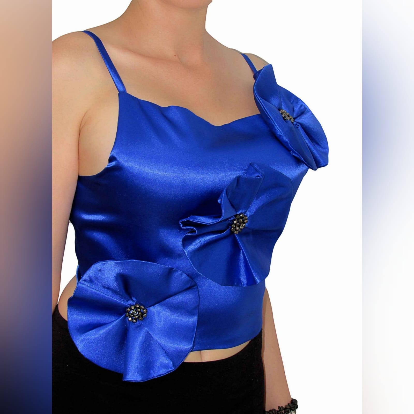 Elegant royal blue flower detail top 1 elegant royal blue flower detail top. Handmade top, a unique design made in several colours. Made in satin with a luxurious shine, perfect for a smart casual event, or even for a more formal event. Made with a lace-up open back to add a sexy touch to the top. And to adjust the fit accordingly.
