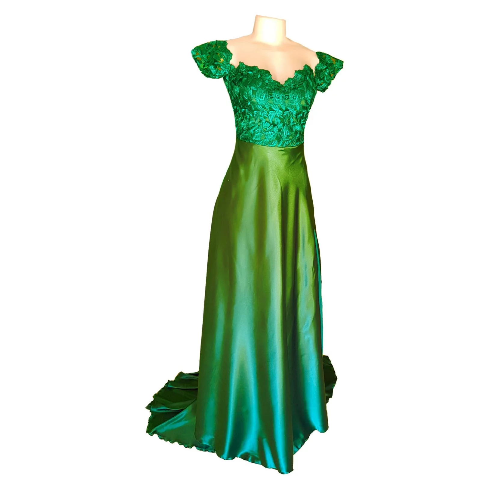 Emerald green satin and lace off shoulder matric farewell dress 1 emerald green satin and lace off shoulder matric farewell dress with a slit and a train and off shoulder cap sleeves.
