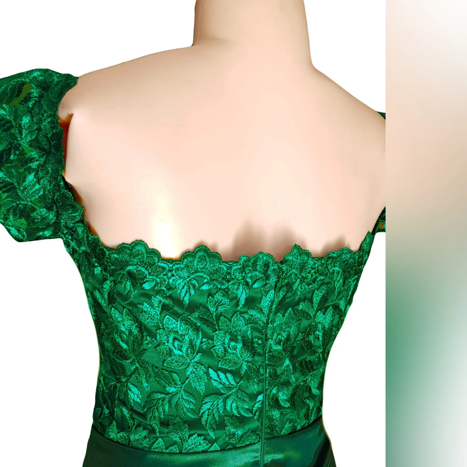 Emerald green satin and lace off shoulder matric farewell dress 5 emerald green satin and lace off shoulder matric farewell dress with a slit and a train and off shoulder cap sleeves.