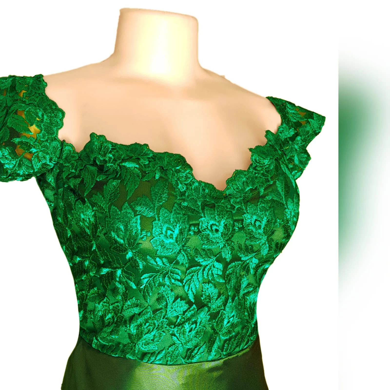 Emerald green satin and lace off shoulder matric farewell dress 4 emerald green satin and lace off shoulder matric farewell dress with a slit and a train and off shoulder cap sleeves.