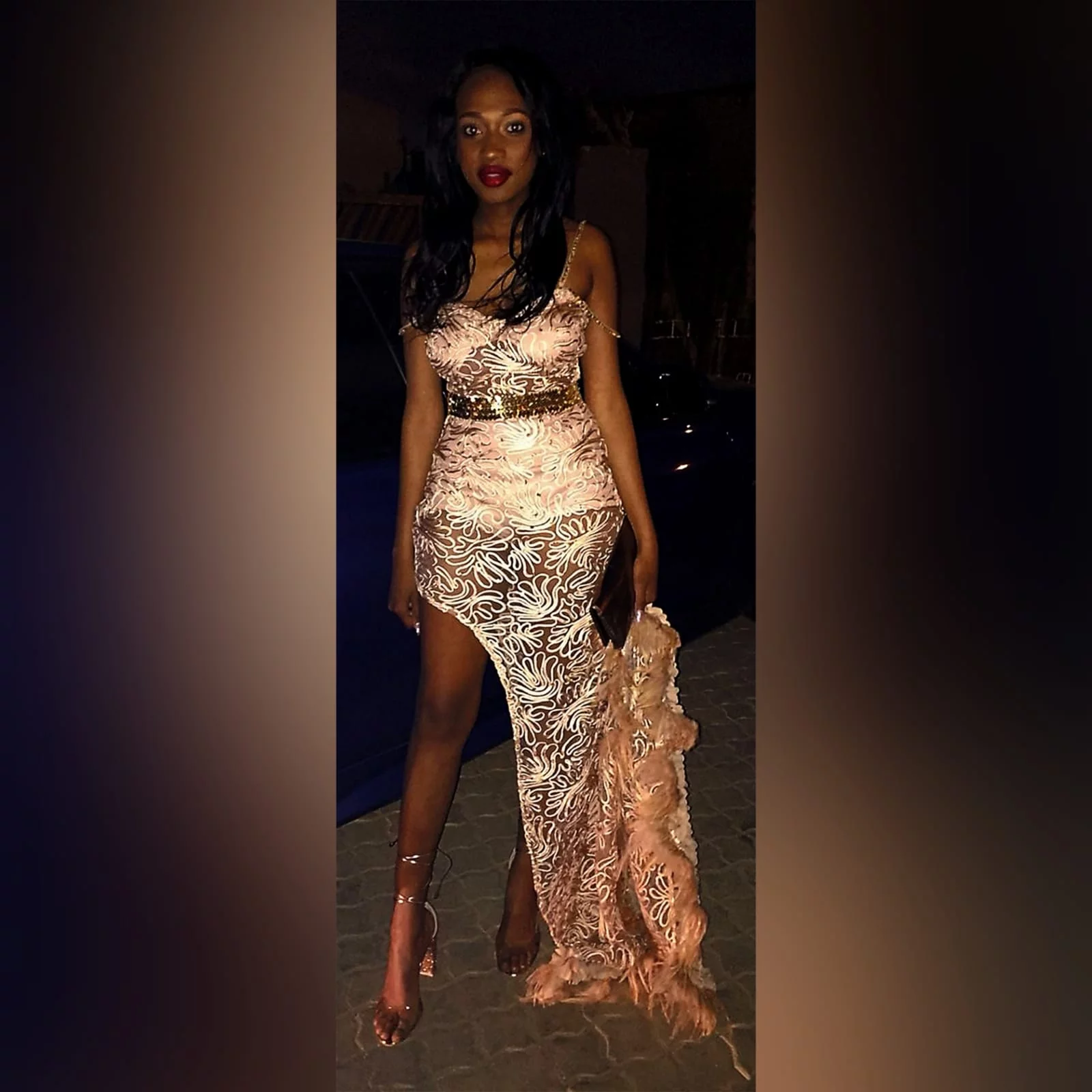 Gold sheer beaded corded long matric farewell dress 9 gold sheer beaded corded long matric farewell dress with a side slit and side train detailed with 3d lace feathers. With an off shoulder strap, removable gold belt.