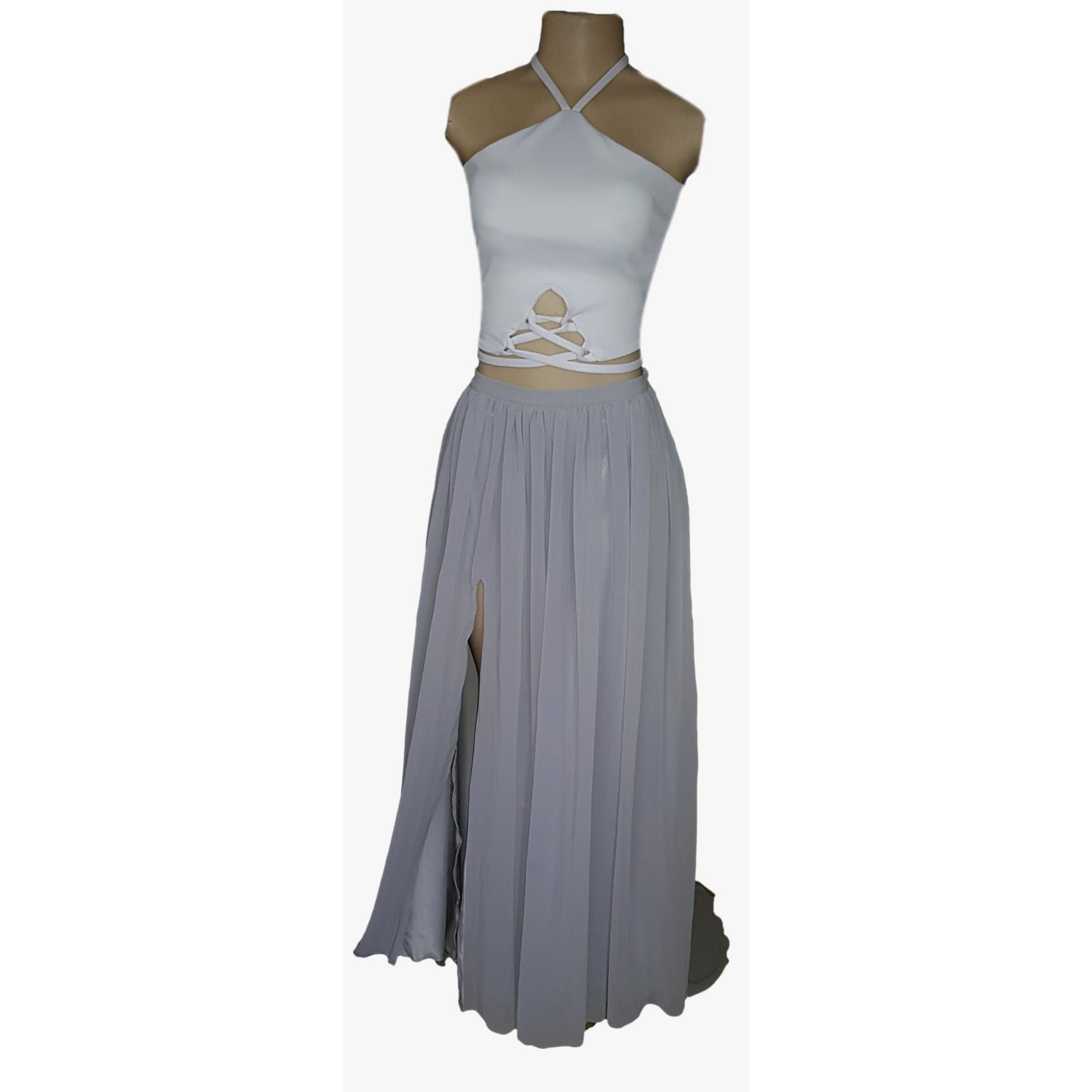 Grey and white 2 piece evening dress 4 grey and white 2 piece evening dress. Backless top lace-up detail, flowy chiffon skirt with a slit and a train.