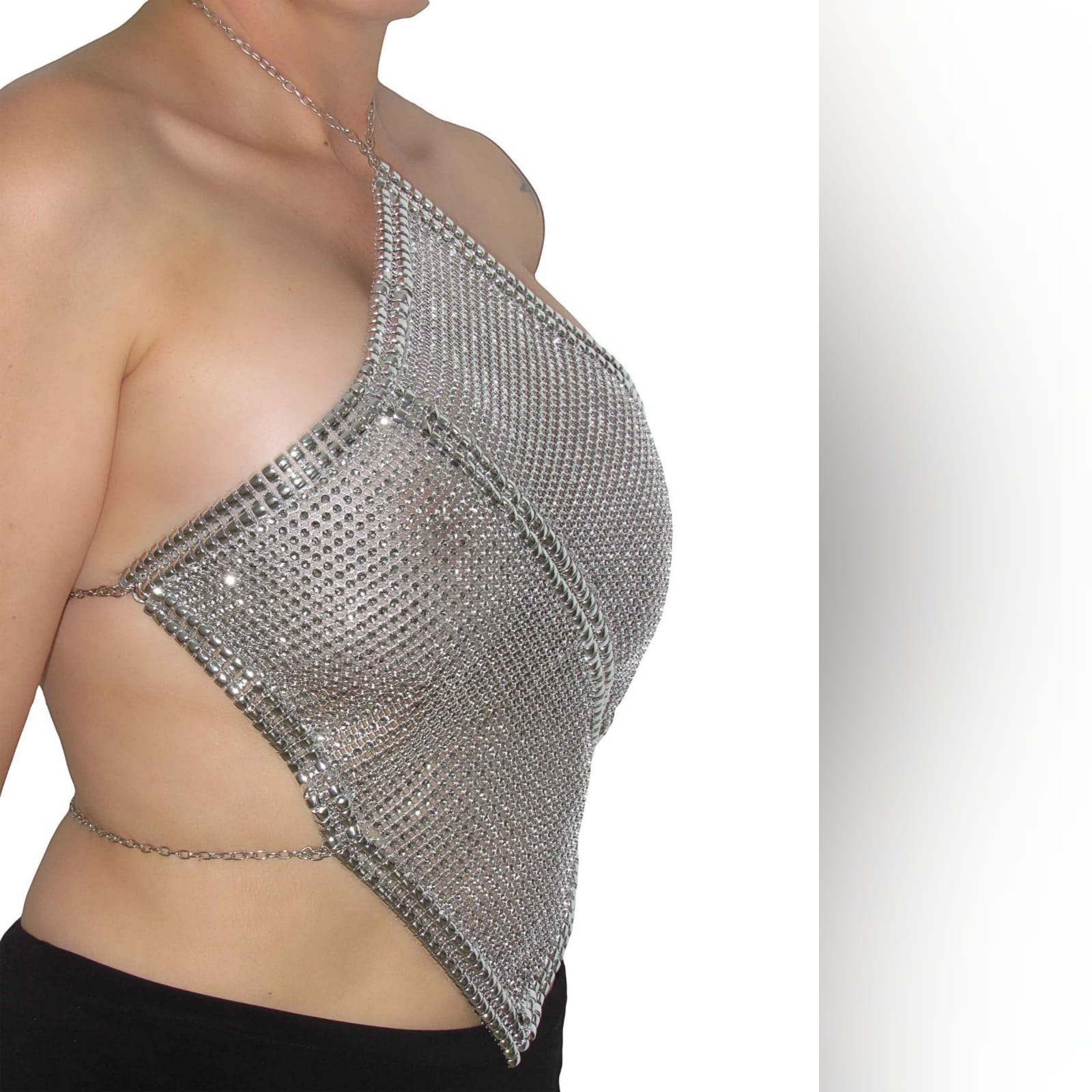 Diamond shape shiny silver crop top 1 diamond shape shiny silver crop top. Sexy top is great for dancing or a fun night out. Ties up on the neck and back with chain, which can be used to adjust the fit a sheer shiny top is great to add glamour and sexy to your look.