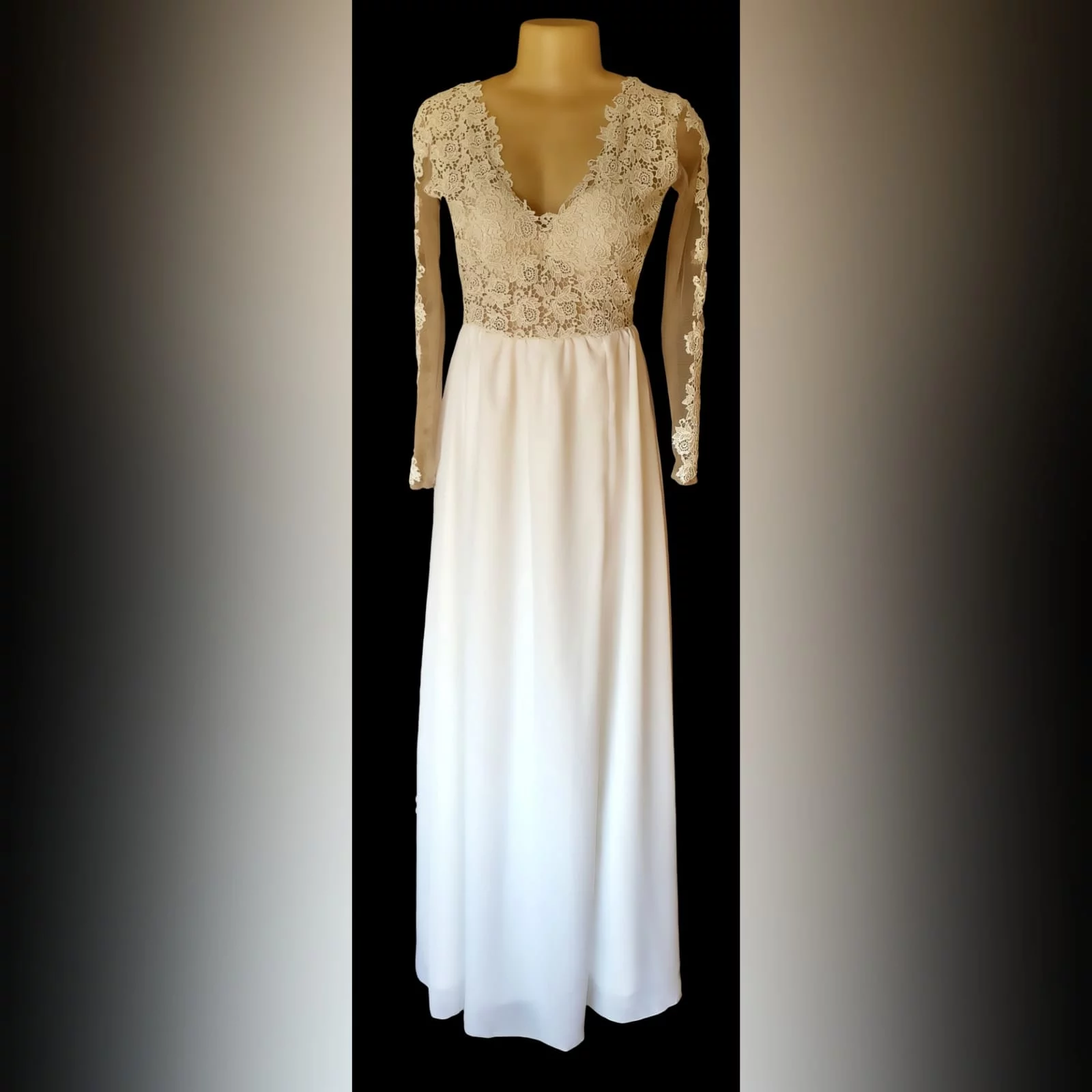 Ivory long chiffon and lace matric farewell dress 2 ivory long chiffon and lace matric farewell dress, with an illusion lace bodice with a rounded open back, long sheer sleeves detailed with lace, and a slit.