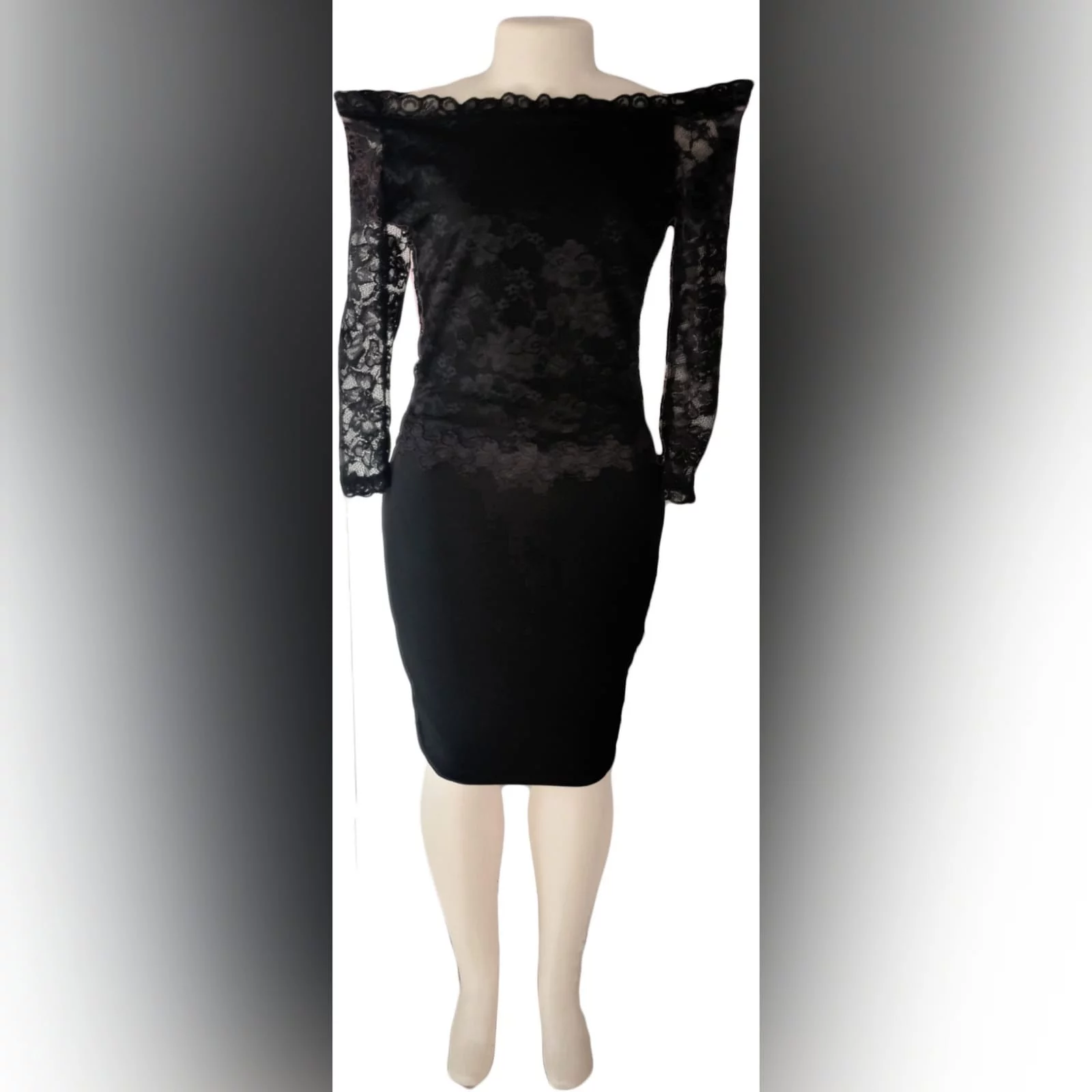 Knee length black fitted evening dress 2 knee length black fitted evening dress. With a stretch lace bodice, off shoulder fit, with long sheer lace sleeves.