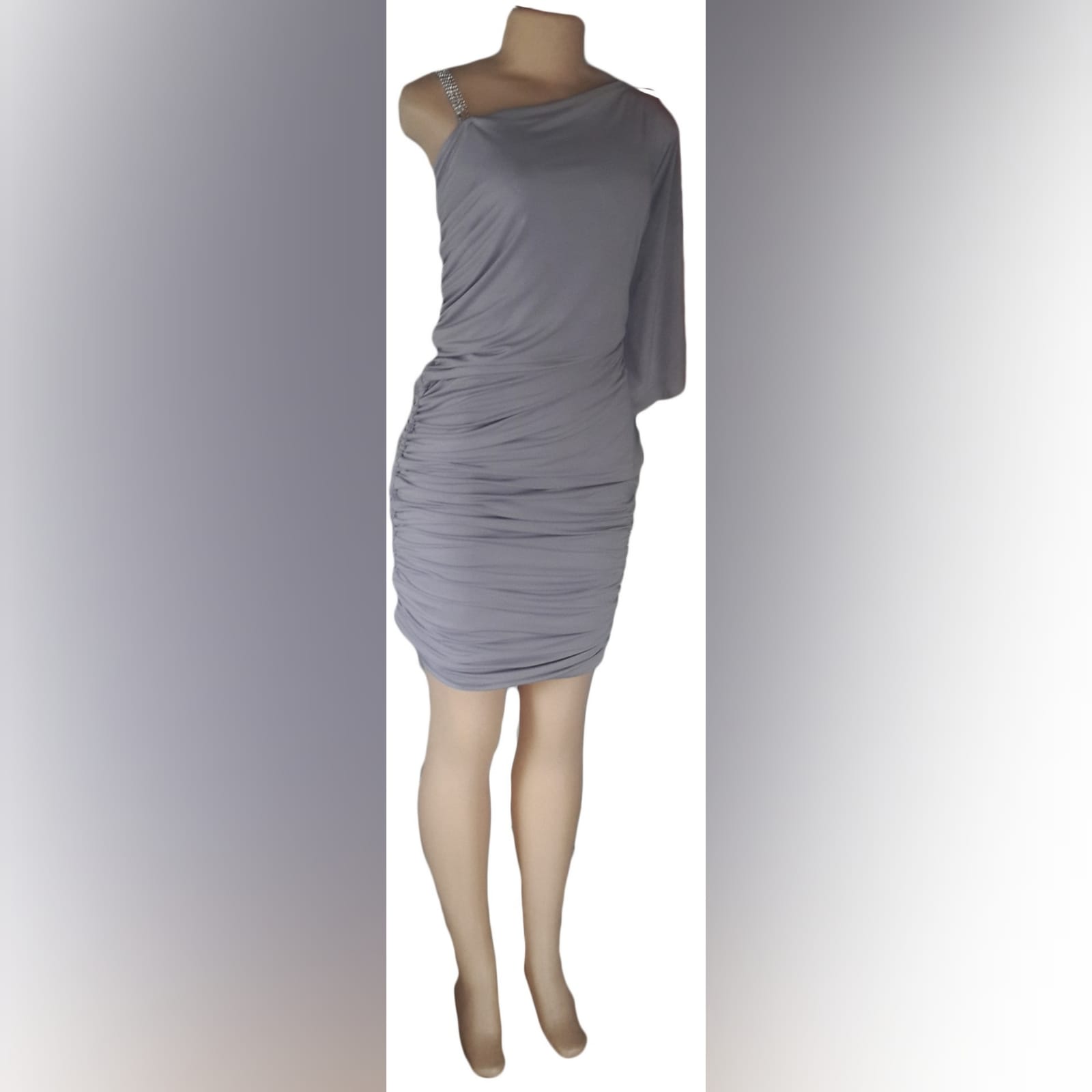 Light grey ruched knee length smart casual dress 4 light grey ruched knee length smart casual dress with one wide sleeve, an angular neckline and a removable diamante shoulder strap.