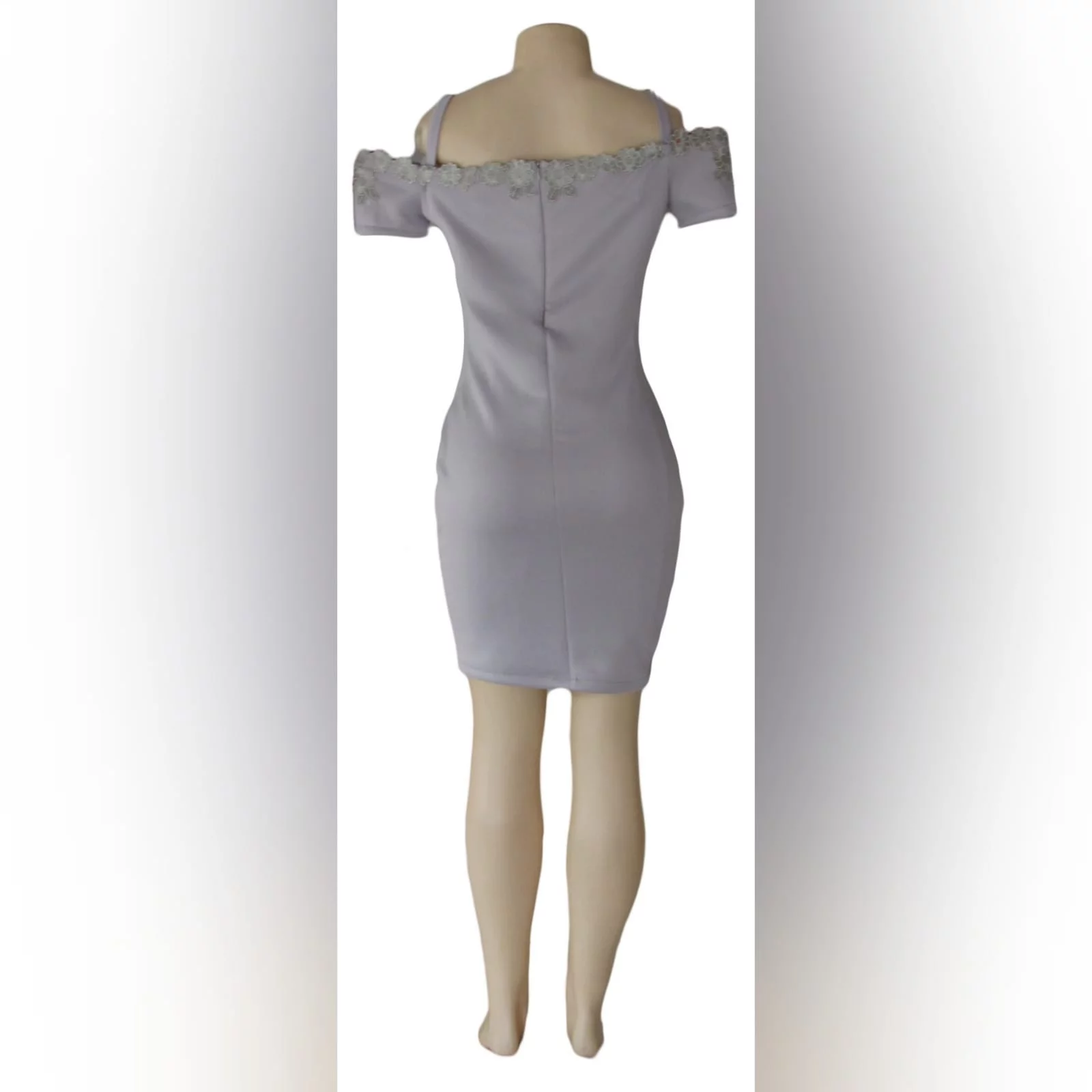 Light grey short fitted smart casual dress 2 light grey short fitted smart casual dress, with off shoulder shorter sleeves and shoulder straps. Neckline detailed with silver lace.