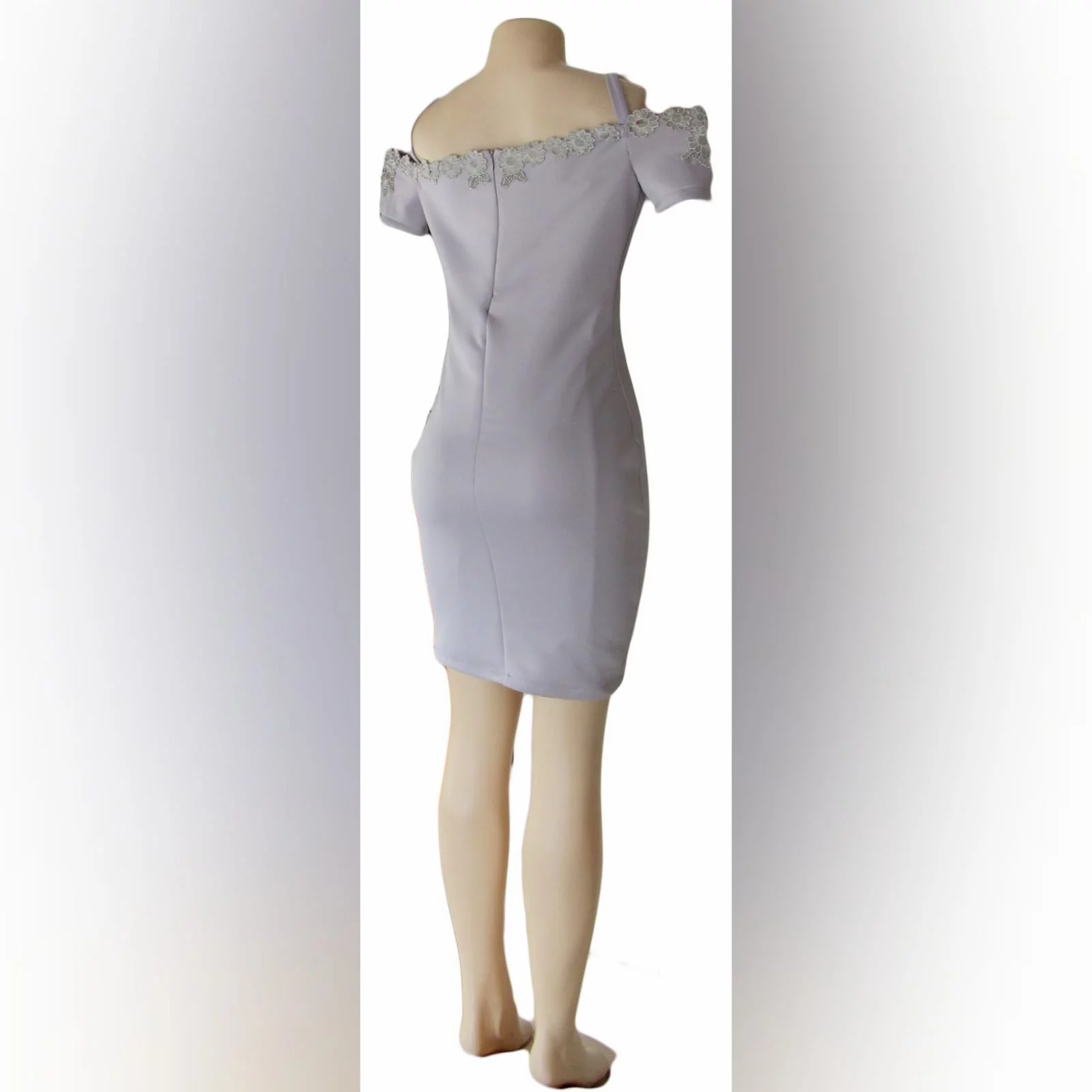 Light grey short fitted smart casual dress 6 light grey short fitted smart casual dress, with off shoulder shorter sleeves and shoulder straps. Neckline detailed with silver lace.
