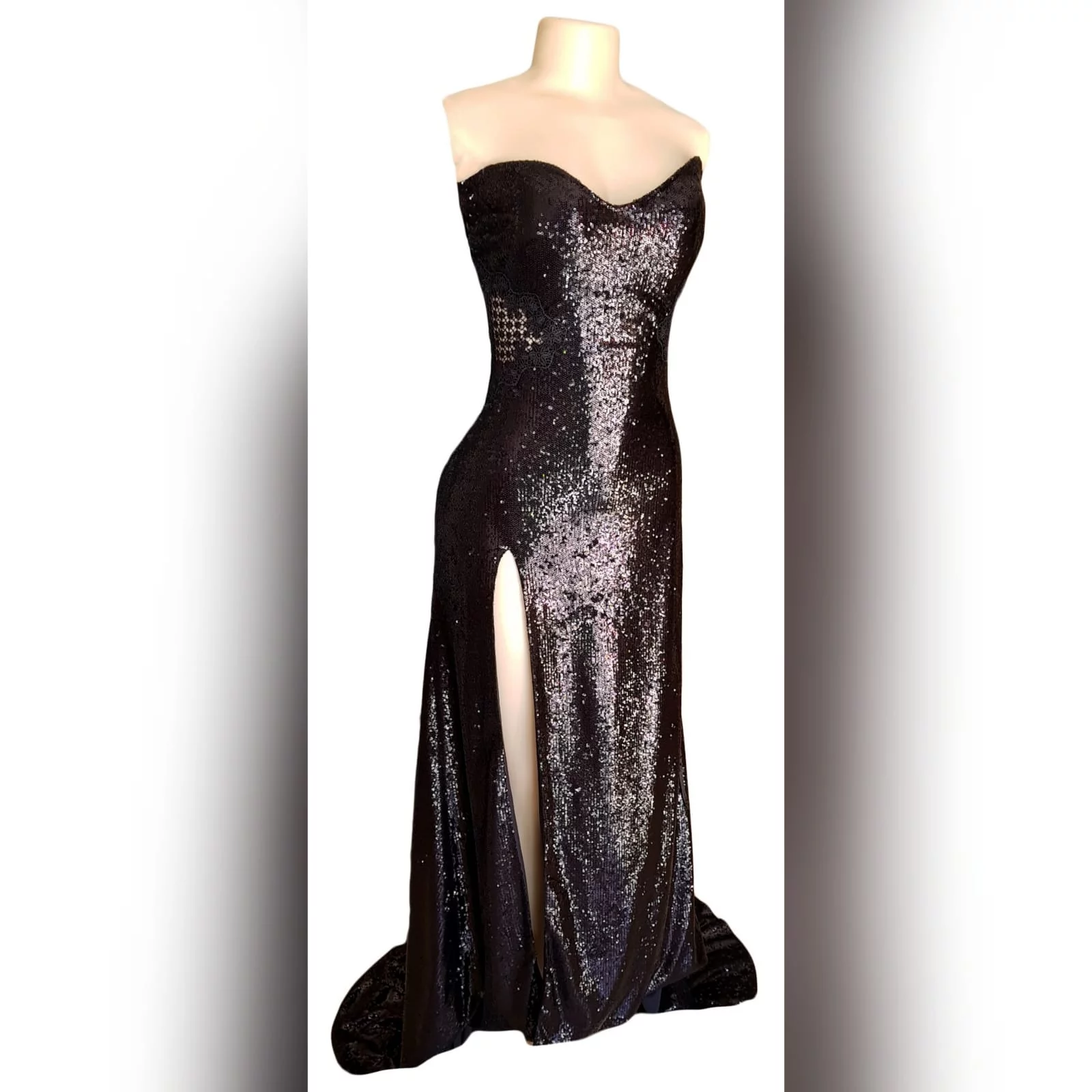 Long black sequins boob tube matric farewell dress 5 long black sequins boob tube matric farewell dress with a sheer lace back and side tummy. High slit and a train.