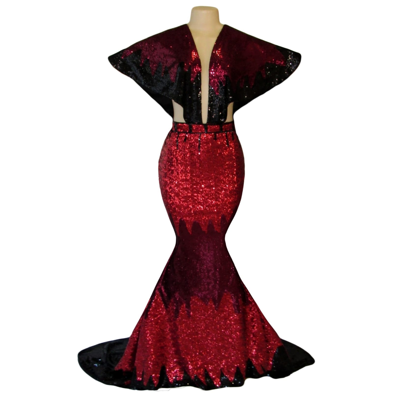 Maroon, burgundy and black sequins prom dress 3 maroon, burgundy and black fully sequined soft mermaid, plunging neckline prom dance dress. With a v open back and wide shoulders creating a short sleeve.