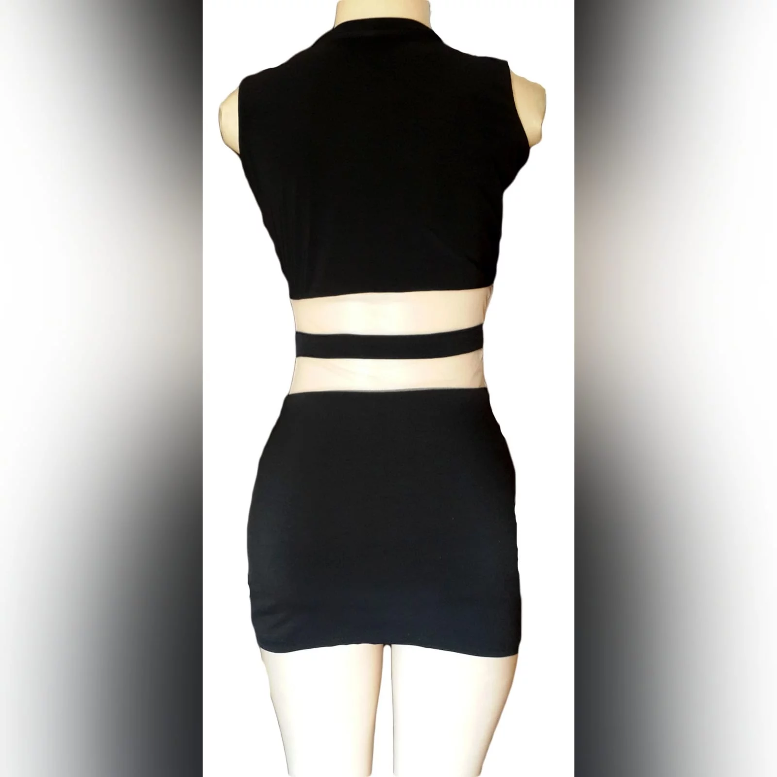 Mini black smart casual dress 4 mini black smart casual dress with see through tummy design and funky neckline