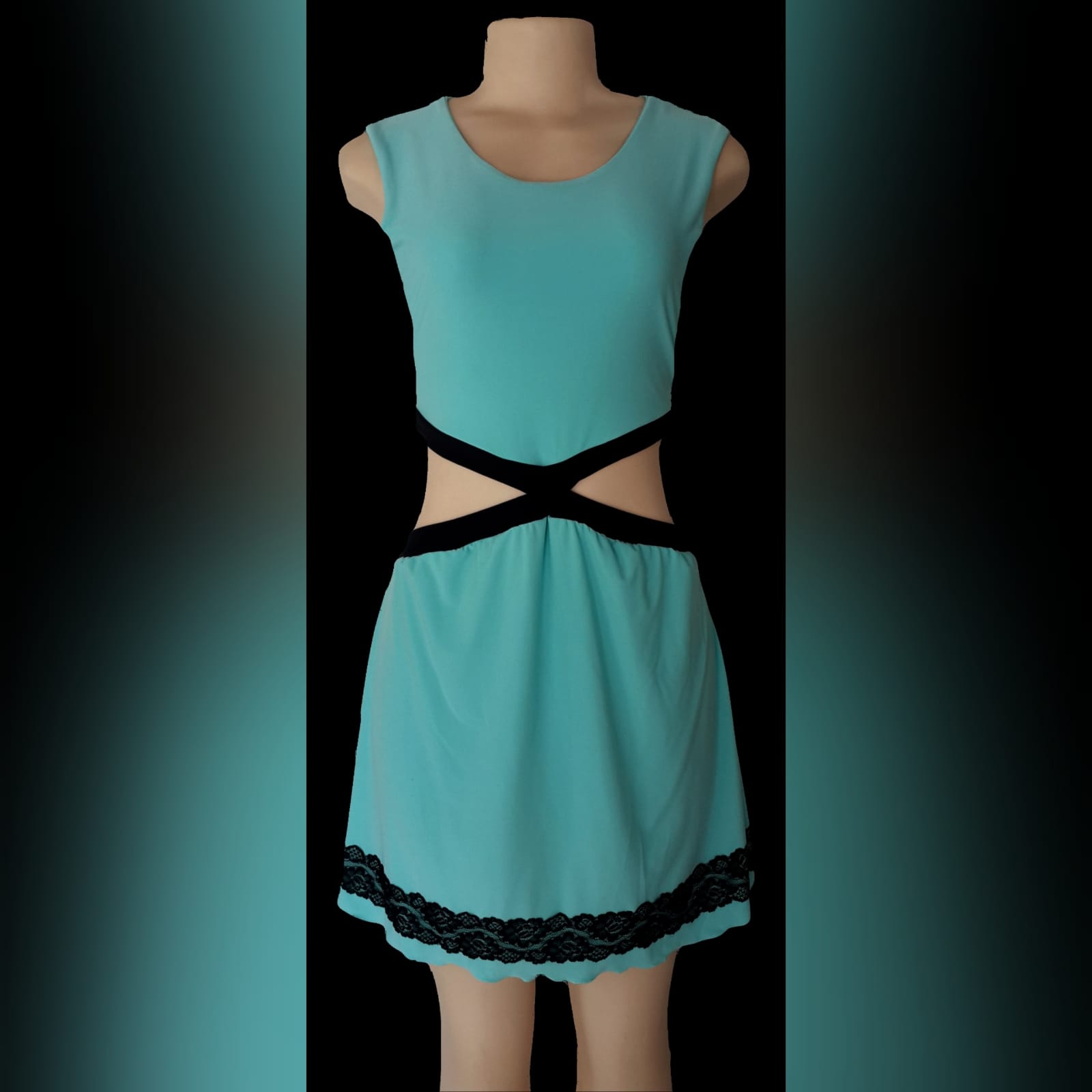 Mint green short smart casual dress 1 mint green short smart casual dress, open side tummy detailed with black and a lace border