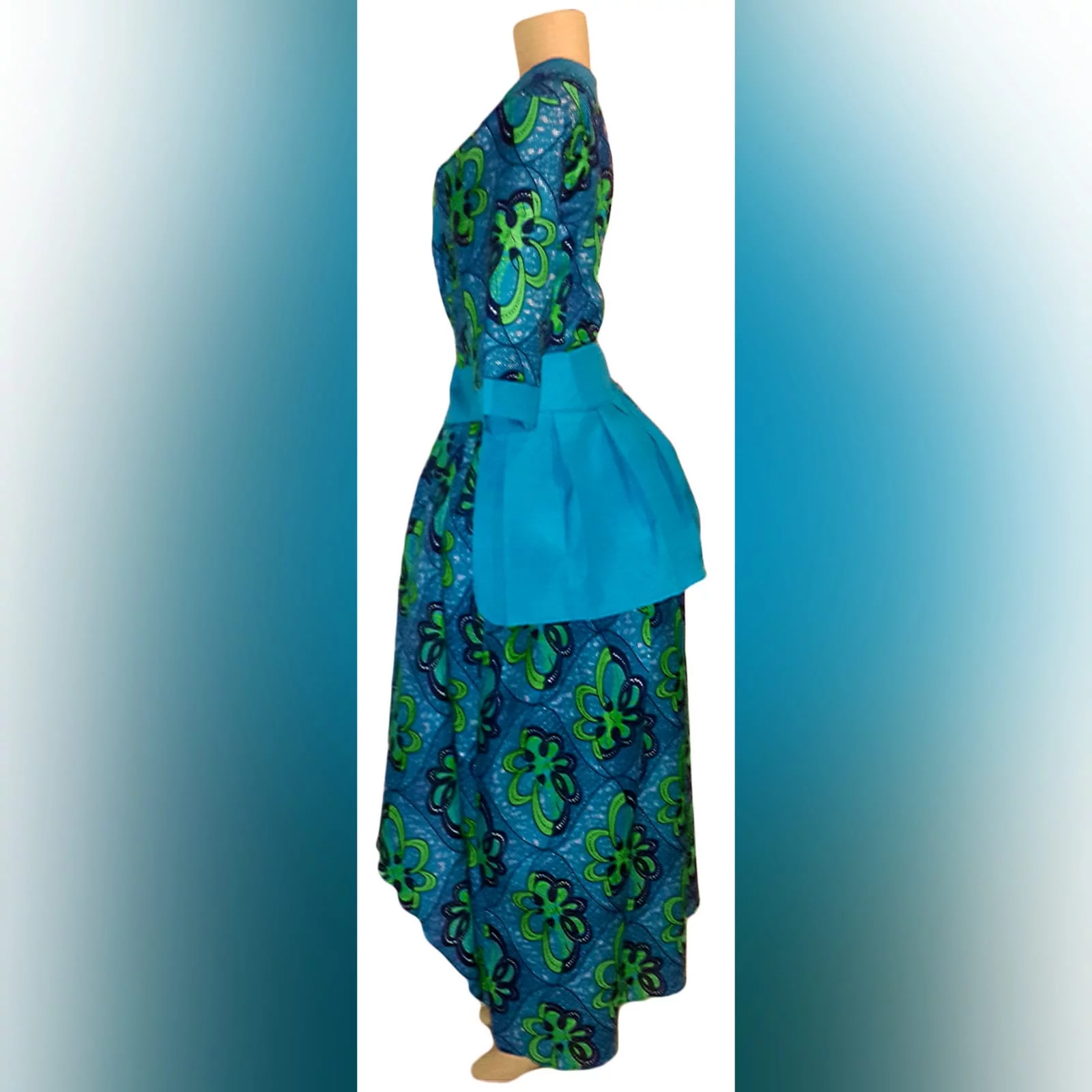Modern traditional green and blue high low dress 2 modern traditional green and blue hi lo dress with a v neckline, 3/4 sleeves and a back peplum with a waistbelt. Matching doek.