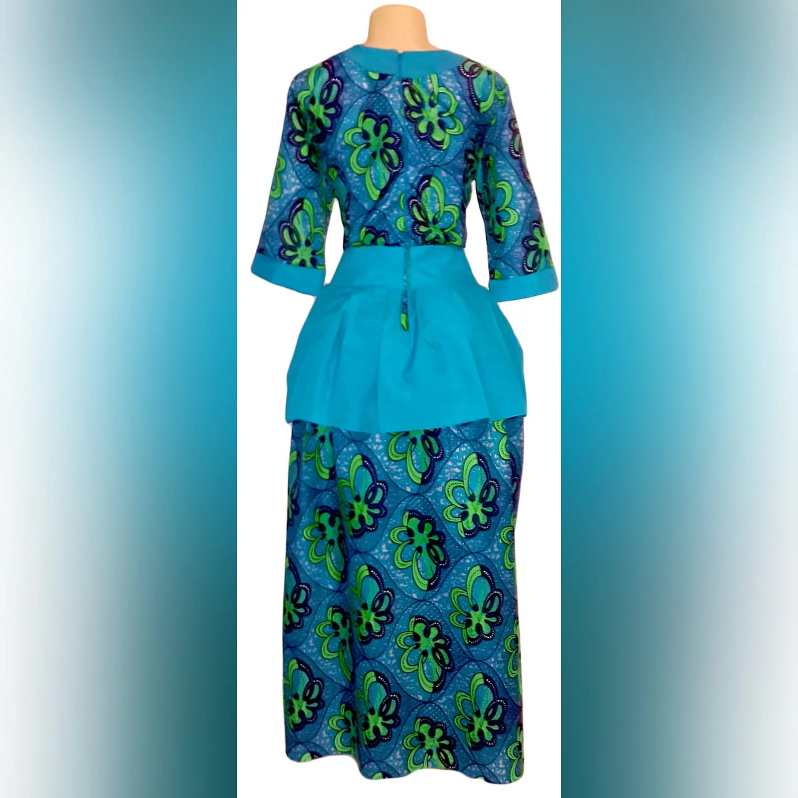 Modern traditional green and blue high low dress 3 modern traditional green and blue hi lo dress with a v neckline, 3/4 sleeves and a back peplum with a waistbelt. Matching doek.