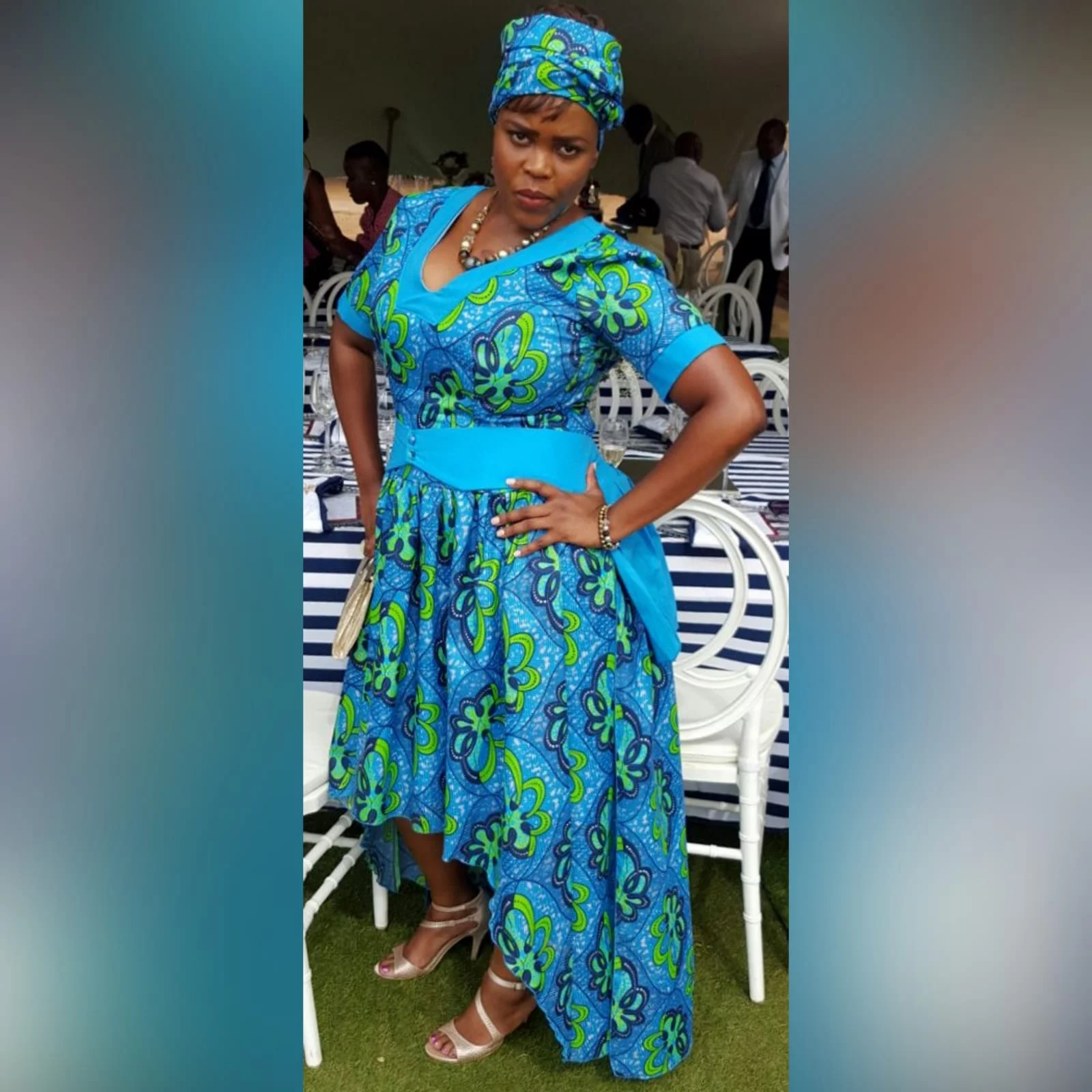 Modern traditional green and blue high low dress 1 modern traditional green and blue hi lo dress with a v neckline, 3/4 sleeves and a back peplum with a waistbelt. Matching doek.