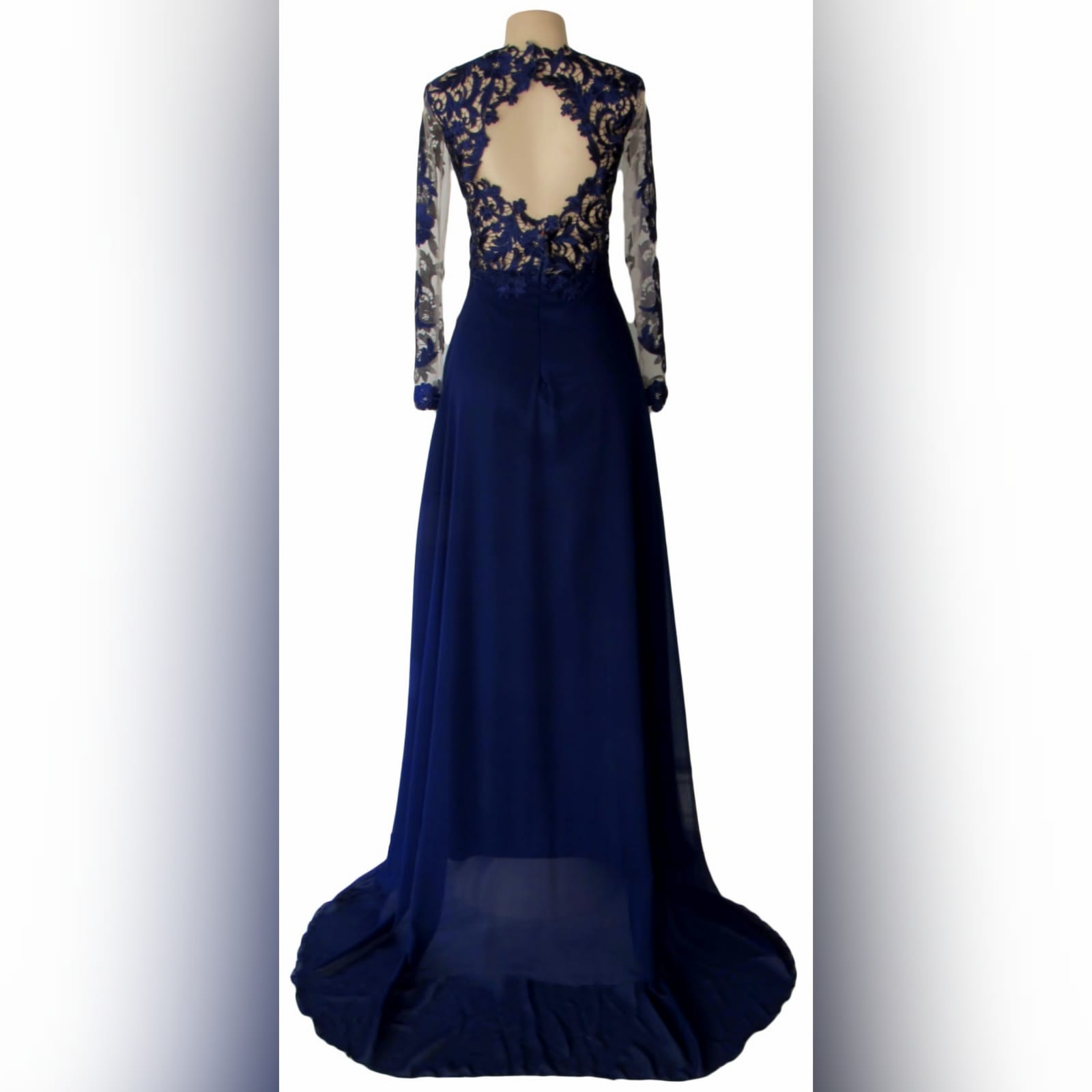 Navy blue lace bodice flowy prom dress 2 navy blue lace bodice flowy matric dance dress with a slit and a train. Illusion long sleeves and a diamond shaped open back.