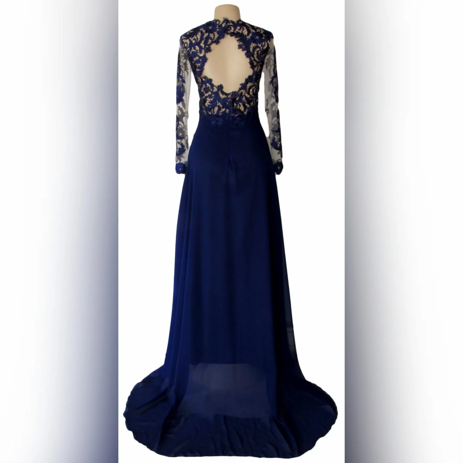 Navy blue lace bodice flowy matric dance dress 2 navy blue lace bodice flowy matric dance dress with a slit and a train. Illusion long sleeves and a diamond shaped open back.