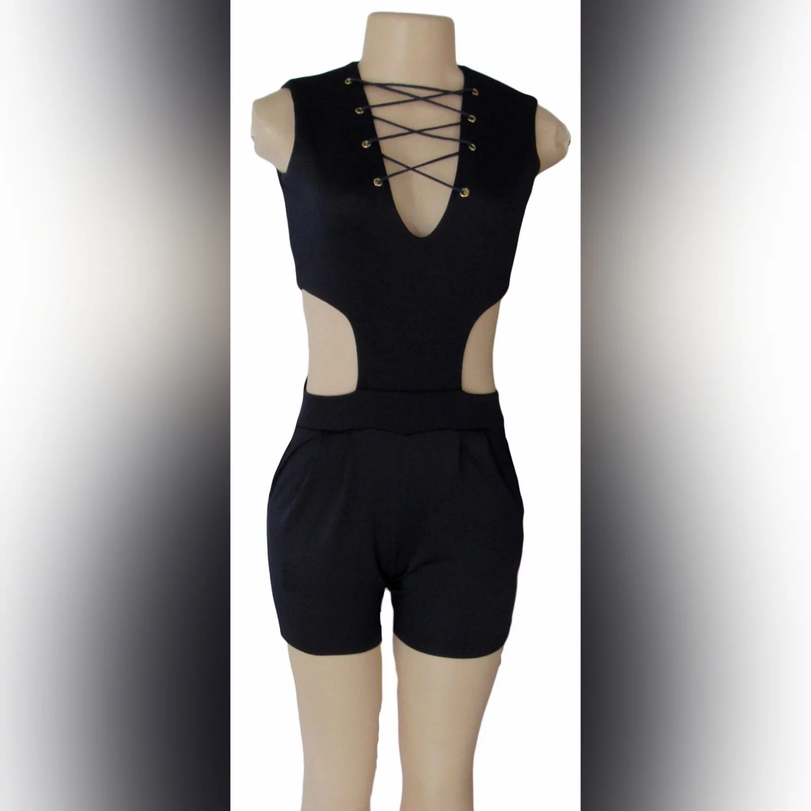 Navy blue smart casual bodysuit 5 navy blue smart casual bodysuit, with side tummy openings, v neckline detailed with lace-up detail, and back with a gold zipper.