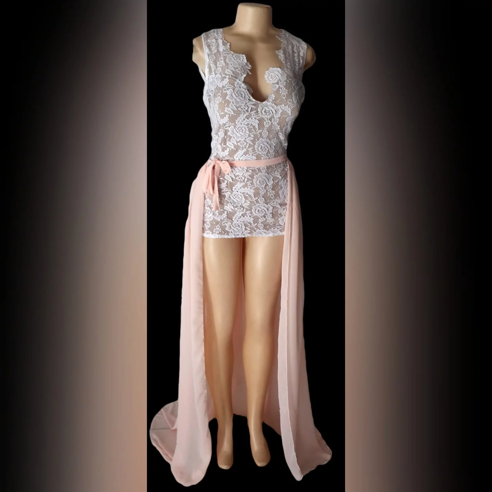 Peach and white 2 piece evening dress 1 peach and white 2 piece evening dress. Mini lace dress with a low open back, with a detachable back peach train