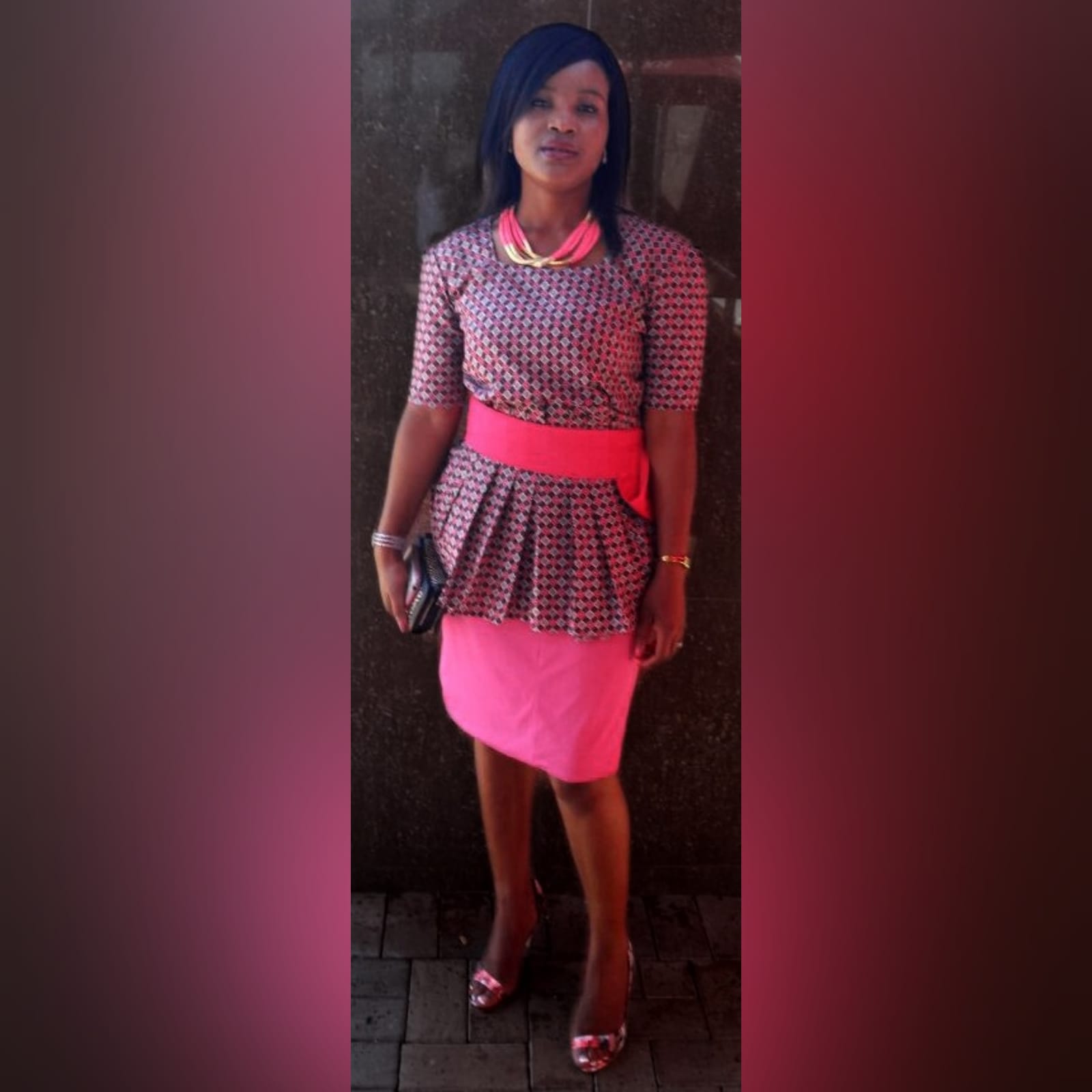 Pink pencil skirt and traditional top in xhosa print 1 a stretch pencil skirt and a traditional top with a square neckline. 3/4 sleeves & frills on the waist. Delivered to the client.