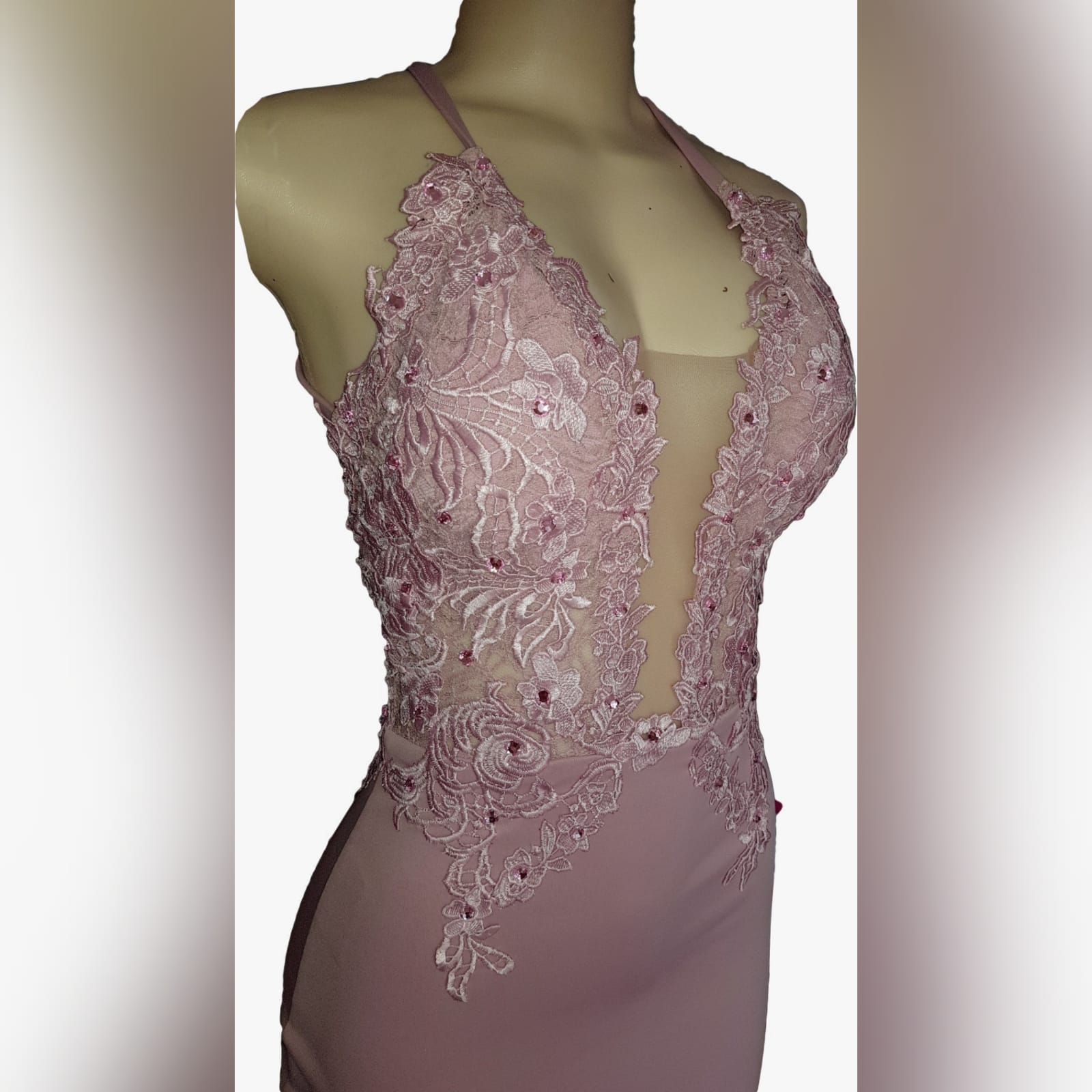 Pink sexy soft mermaid prom dress 2 look ravishing on your prom night with this pink sexy soft mermaid prom dress. A fitted lace bodice with a plunging neckline, low back and a train to add some glamour to your important event.