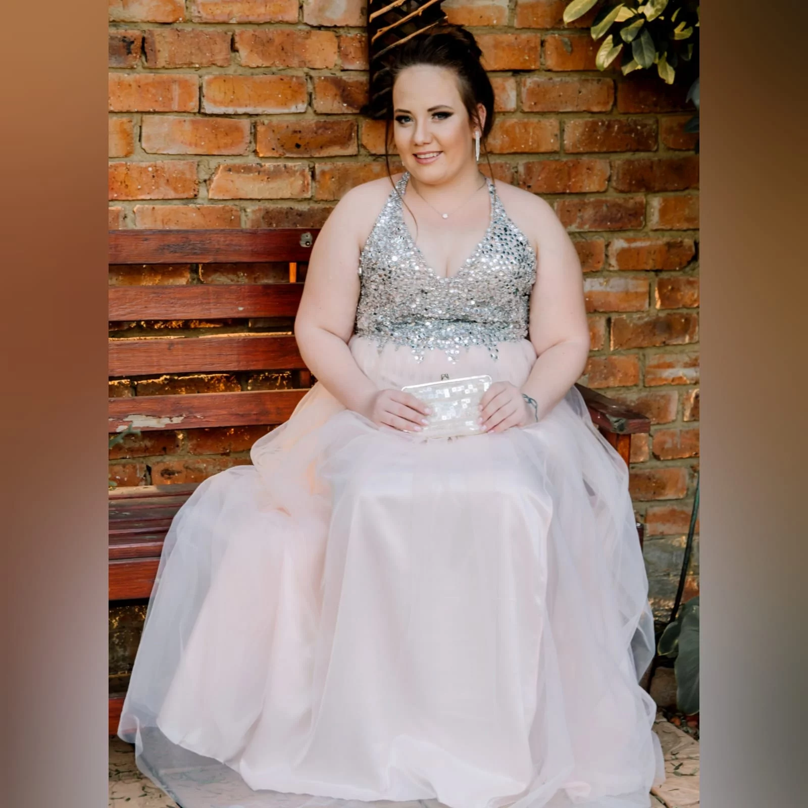 Pink nude and silver long plus size prom dress 3 pink nude and silver long plus size prom dress with a beaded bodice and a lace up back and a tulle bottom.