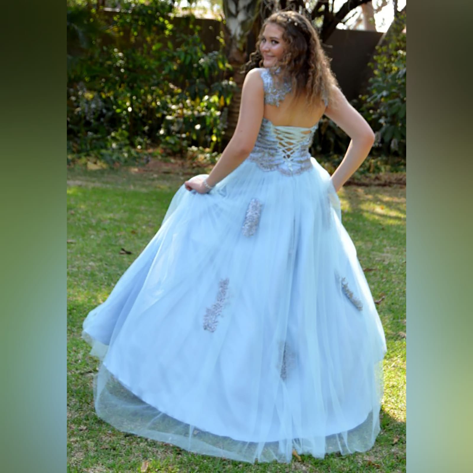 Powder blue and silver prom ball gown dress 4 powder blue and silver prom ball gown dress. With a lace-up back. Bodice detailed with silver lace and beads. Illusion neckline and shoulders. Bottom of the dress with tulle detailed with lace appliques.