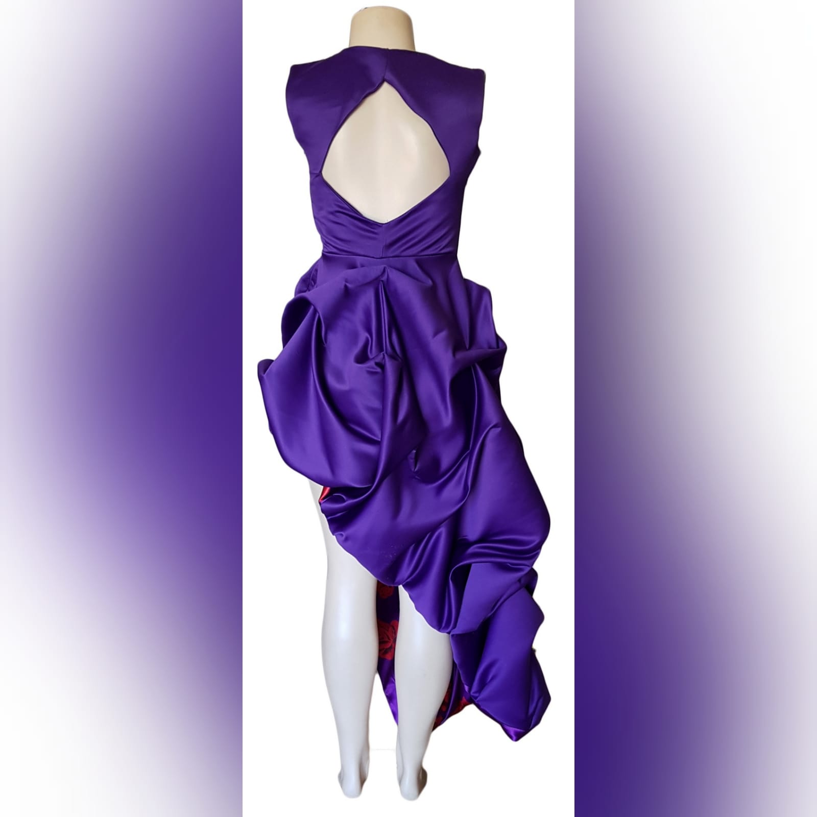 Purple and violet side high low prom dress 4 purple and violet side high low prom dress with a teardrop neckline and a diamond-shaped open back. With pull-ups lined with violet and red roses. Rose bust details.