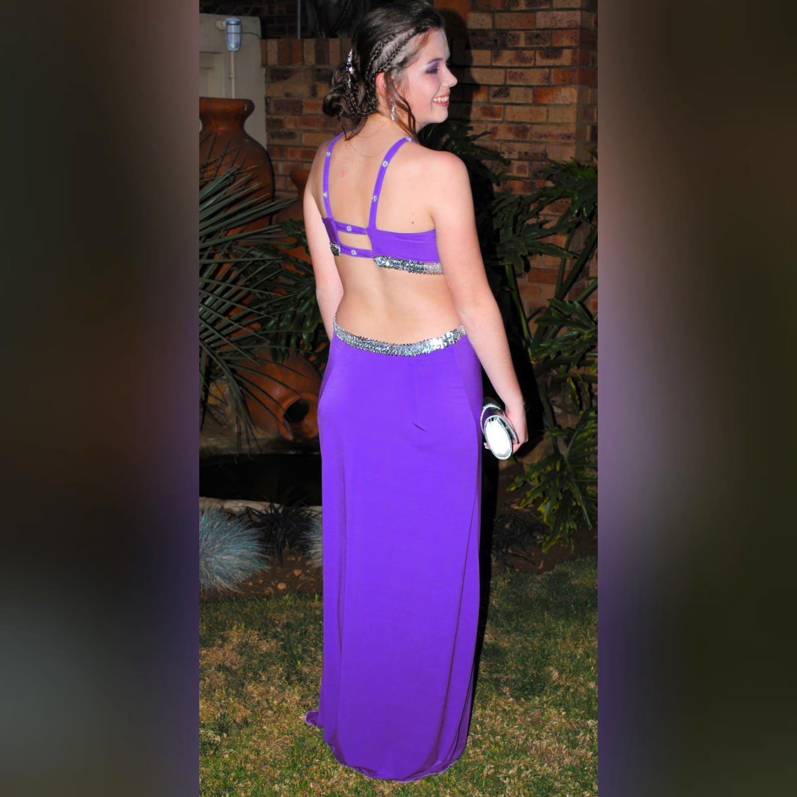 Purple long sexy prom dress 3 purple long sexy prom dress, with side tummy openings, cleavage opening, open low back and a slit, all detailed with silver sequins.