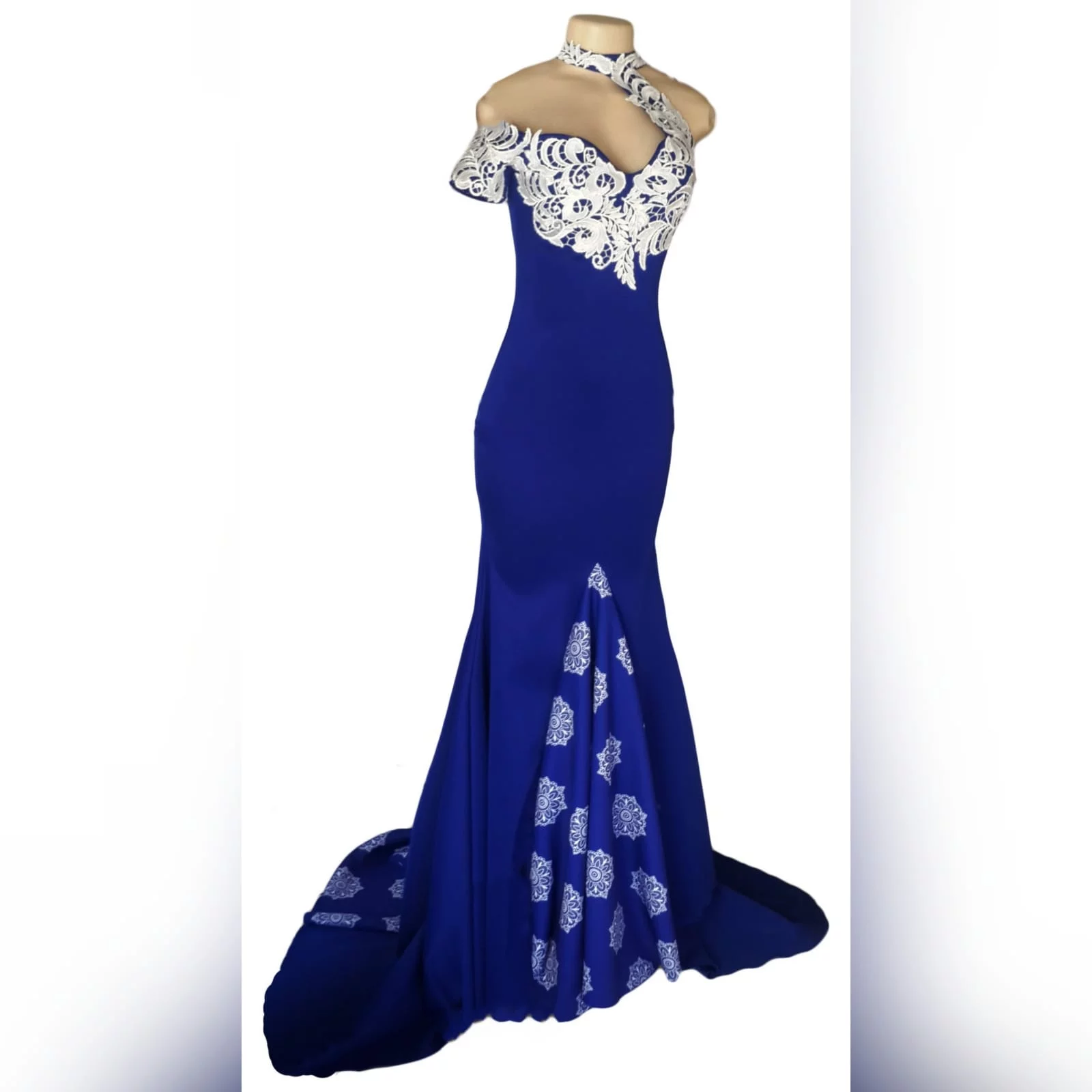 Royal blue and white pageant dress 5 royal blue and white soft mermaid pageant evening dress, with a choker neckline, with one off shoulder short sleeve. Dress has a front and back panel with a print. Dress has a train