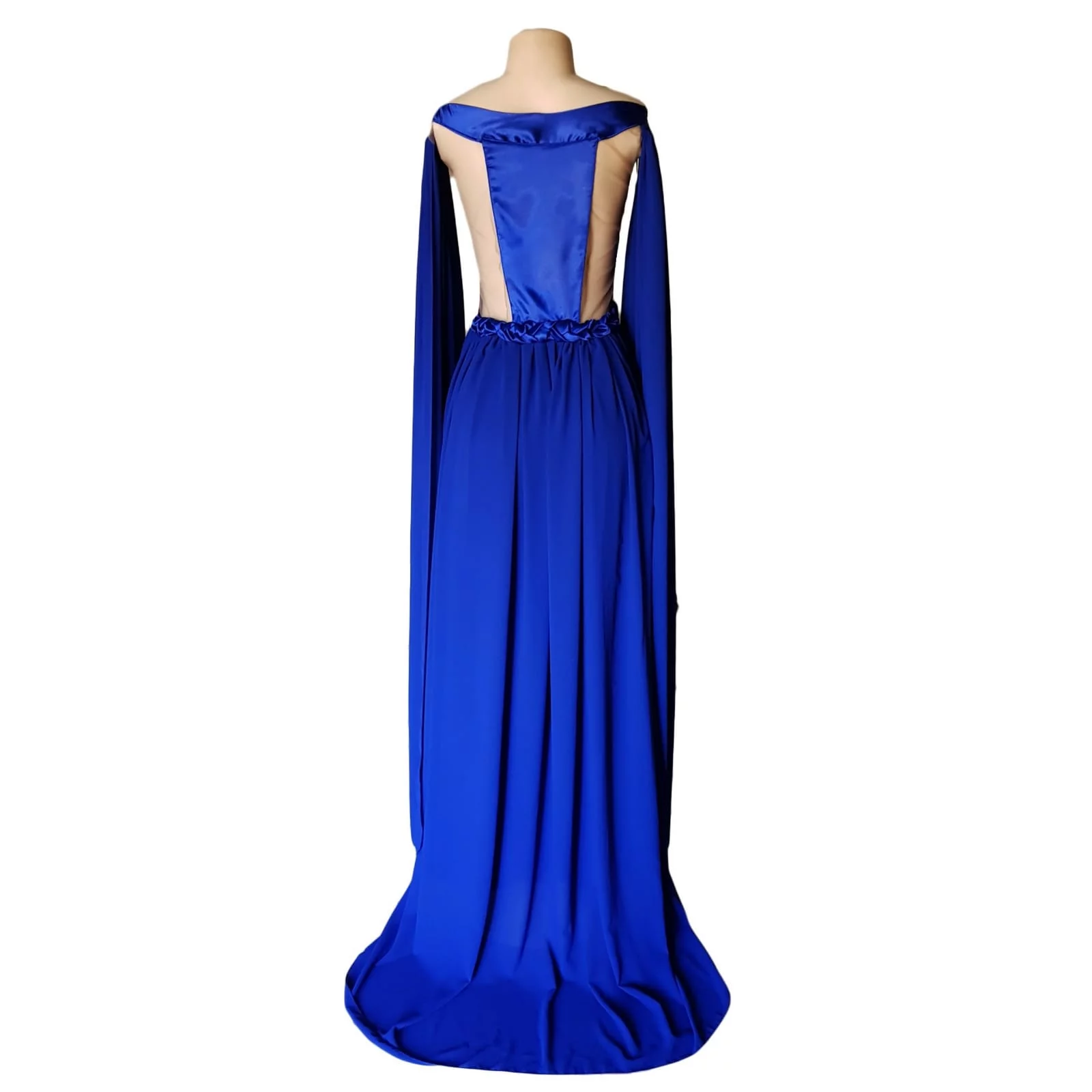 Royal blue flowy long matric dance dress 6 royal blue flowy long matric dance dress with a slit and a train. With 2 shoulder flowy chiffon detail. With a plaited belt and an illusion back.