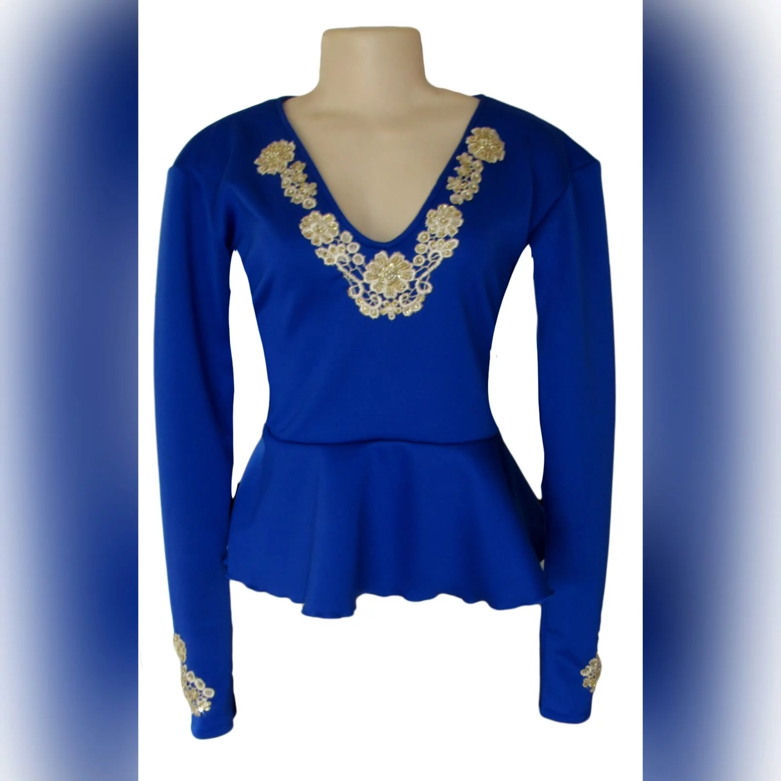 Royal blue & gold peplum smart casual top 1 royal blue & gold peplum smart casual top, long sleeves, v neckline & cuffs detailed with gold beaded lace