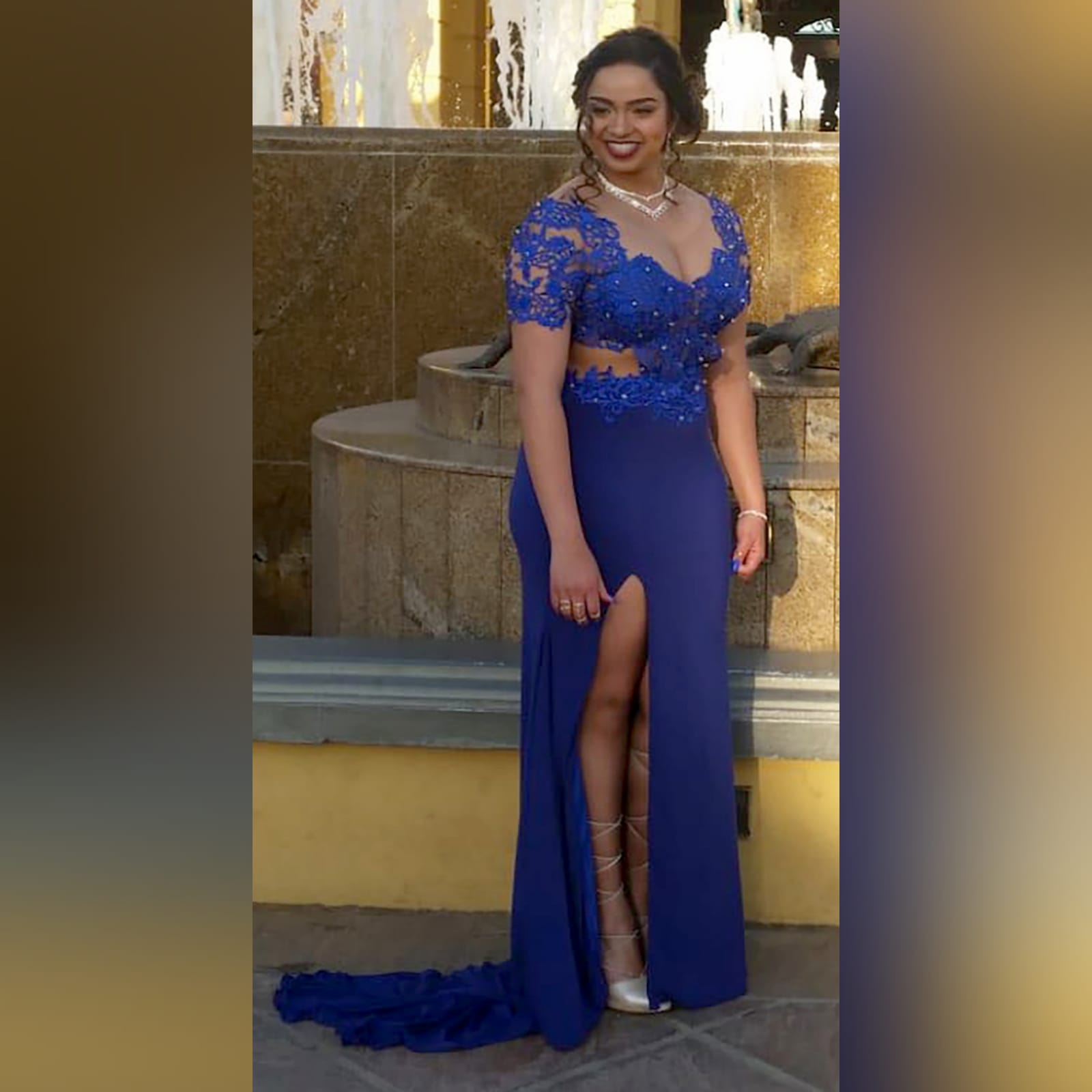 Royal blue shimmer long prom dress 7 royal blue shimmer long prom dress with a lace illusion bodice, side tummy & back opening with a sweetheart neckline. Slit and a train. Lace detailed with gold beads.