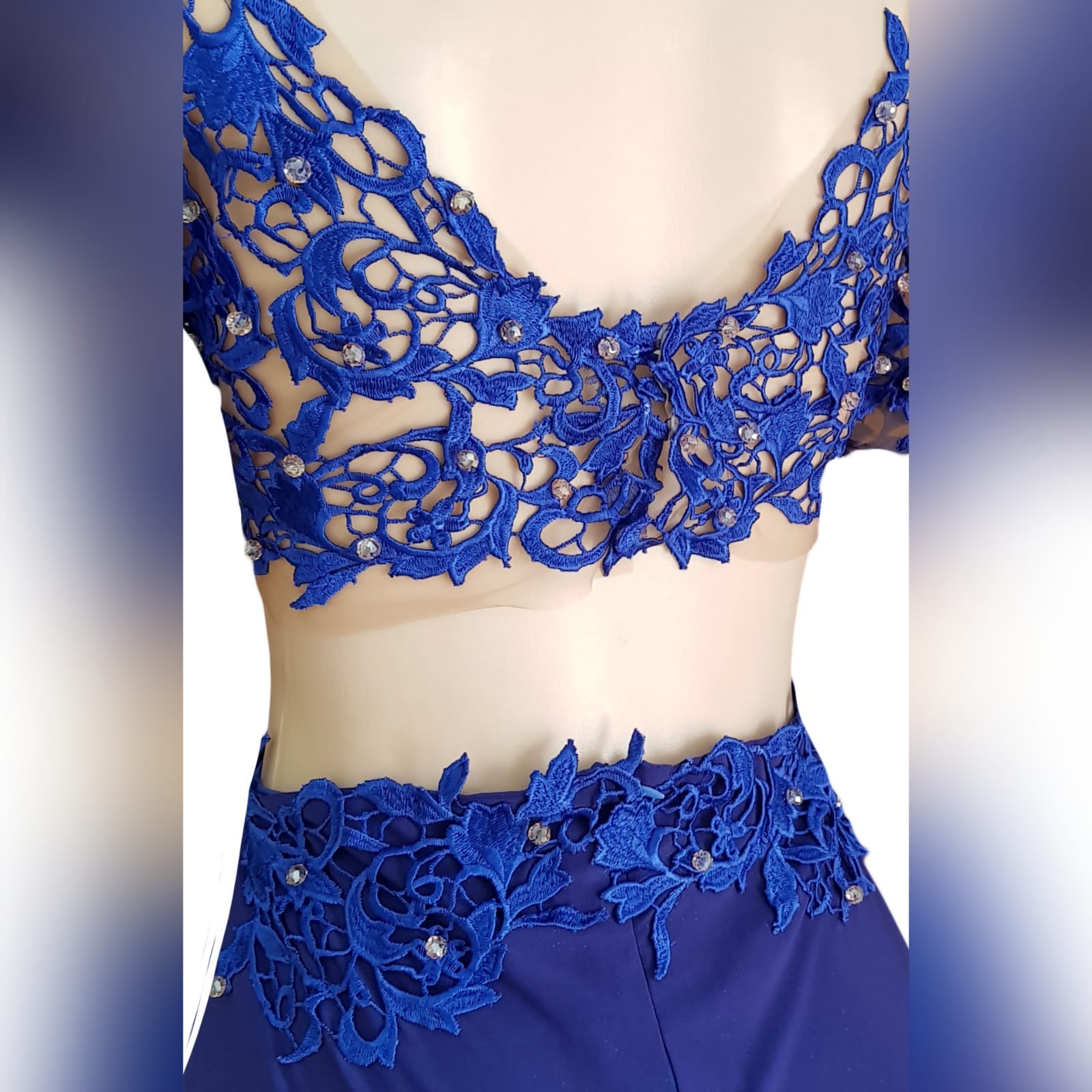Royal blue shimmer long prom dress 5 royal blue shimmer long prom dress with a lace illusion bodice, side tummy & back opening with a sweetheart neckline. Slit and a train. Lace detailed with gold beads.