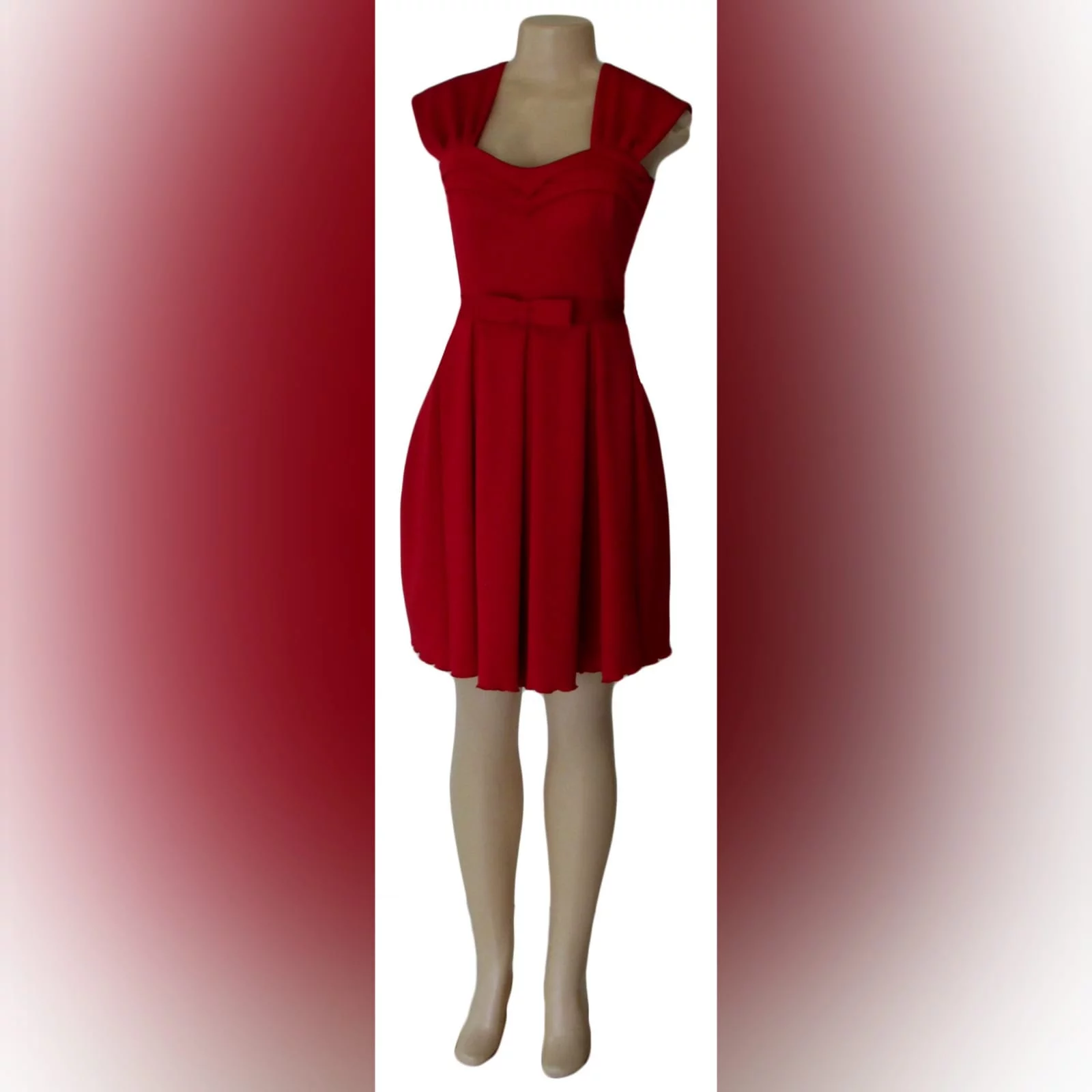 Short red pleated evening dress 1 short red pleated evening dress with a pleated sweetheart neckline and a detachable belt with bow detail