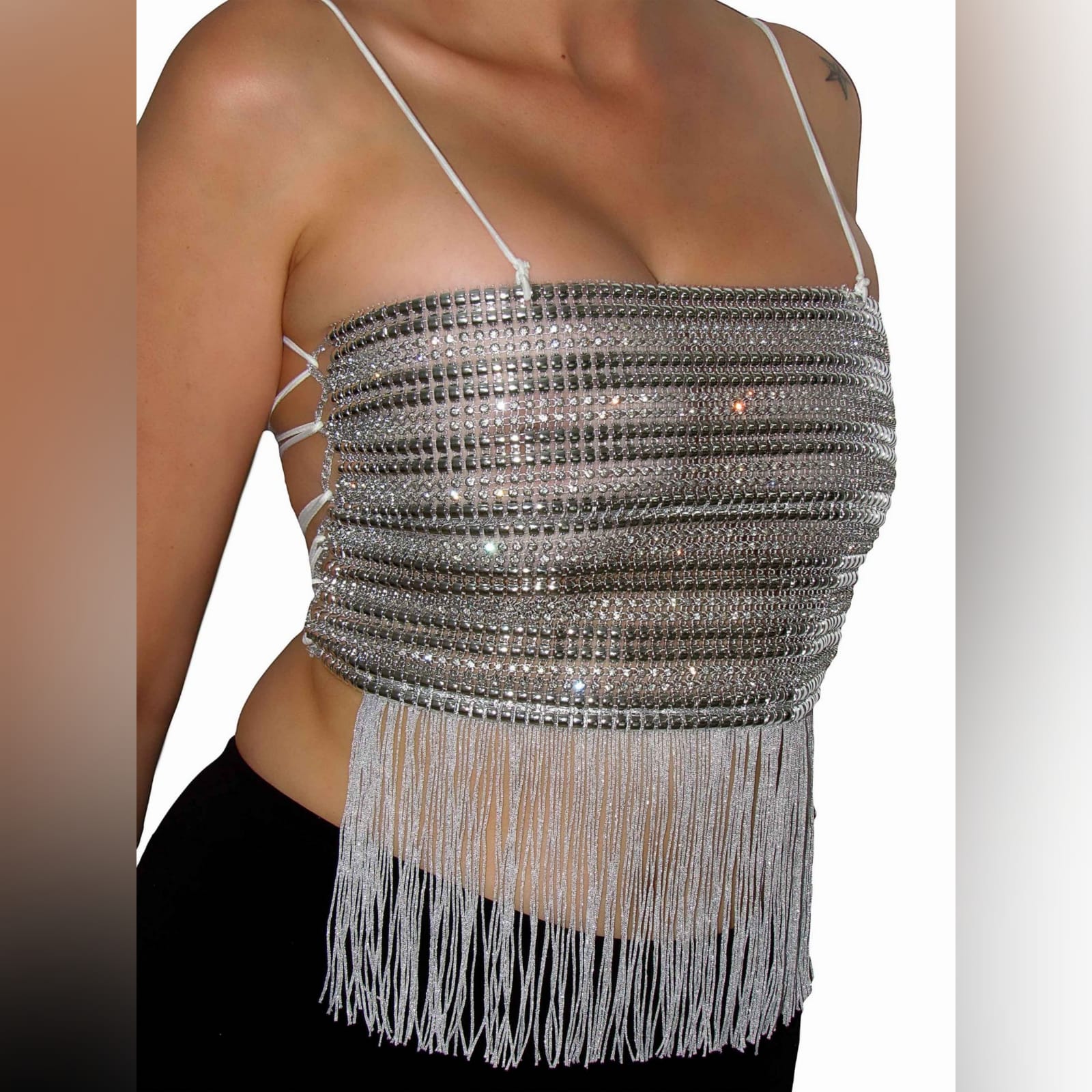 Silver striped diamante top 1 silver striped diamante top, a one of a kind. Handmade crop top with a fun tassel hemline. This open-back top has an elasticated white rope to create a lace-up, also helps to adjust to fit.