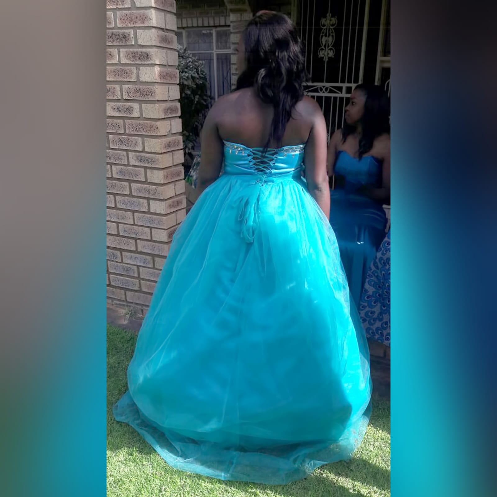 Turquoise and silver ball gown custom made wedding dress 2 turquoise & silver ball gown custom-made wedding dress. With a sweetheart neckline. A lace-up back with an optional back cover panel. Detailed with silver diamante and beads. Ruched belt effect.